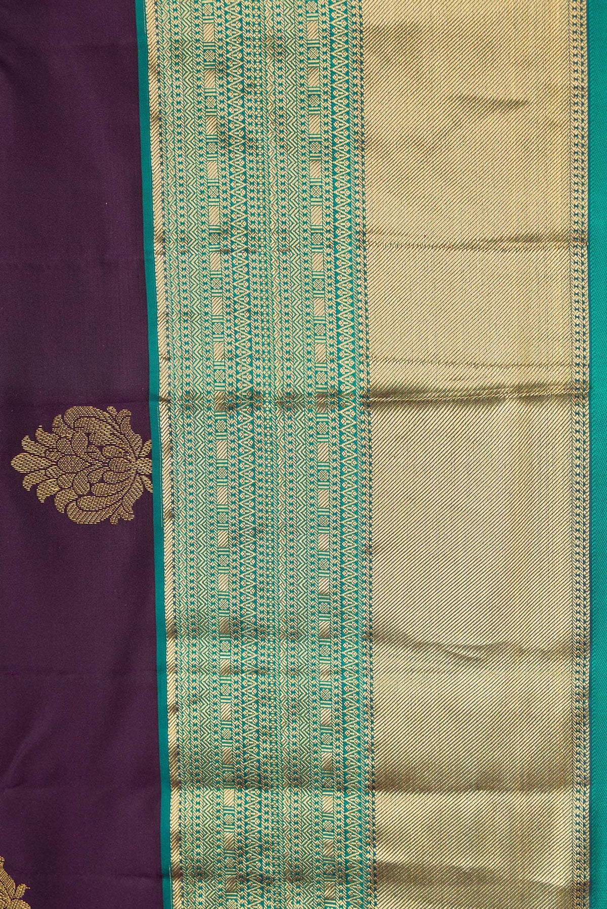 Border image of Burgundy Dual Tone Kanchipuram Silk Saree with Zari Butta on the body and Zari Border. 