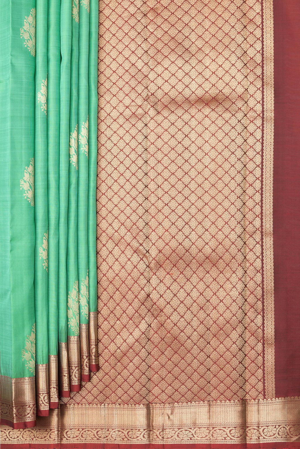 Pleats and pallu of Pista Green Dual Tone Kanjivaram Silk Saree with Zari Butta on the body and Zari Border. 