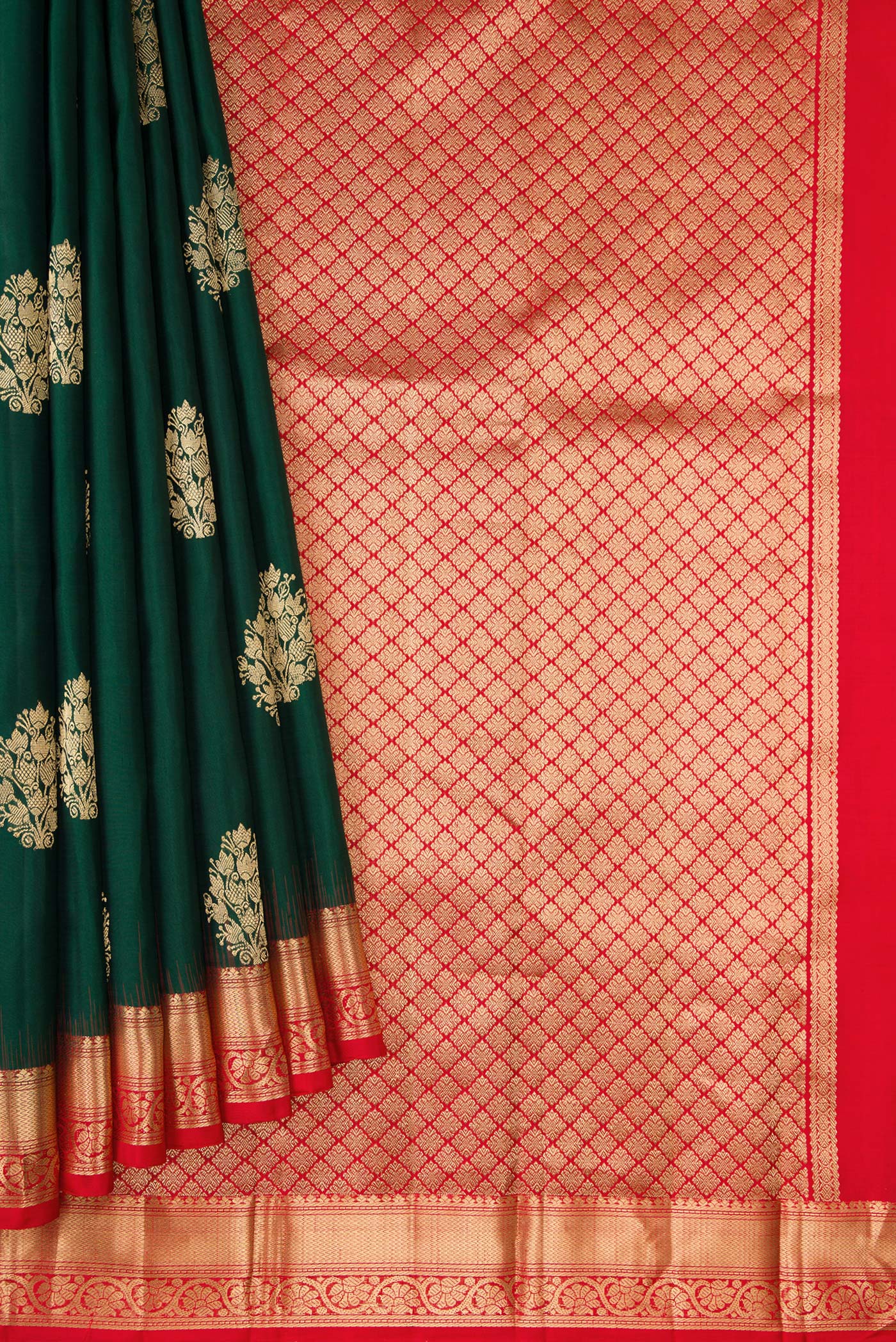 Pleats and pallu of Bottle Green Dual Tone Kanjivaram Silk Saree with Zari Butta on the body and Zari Border. 