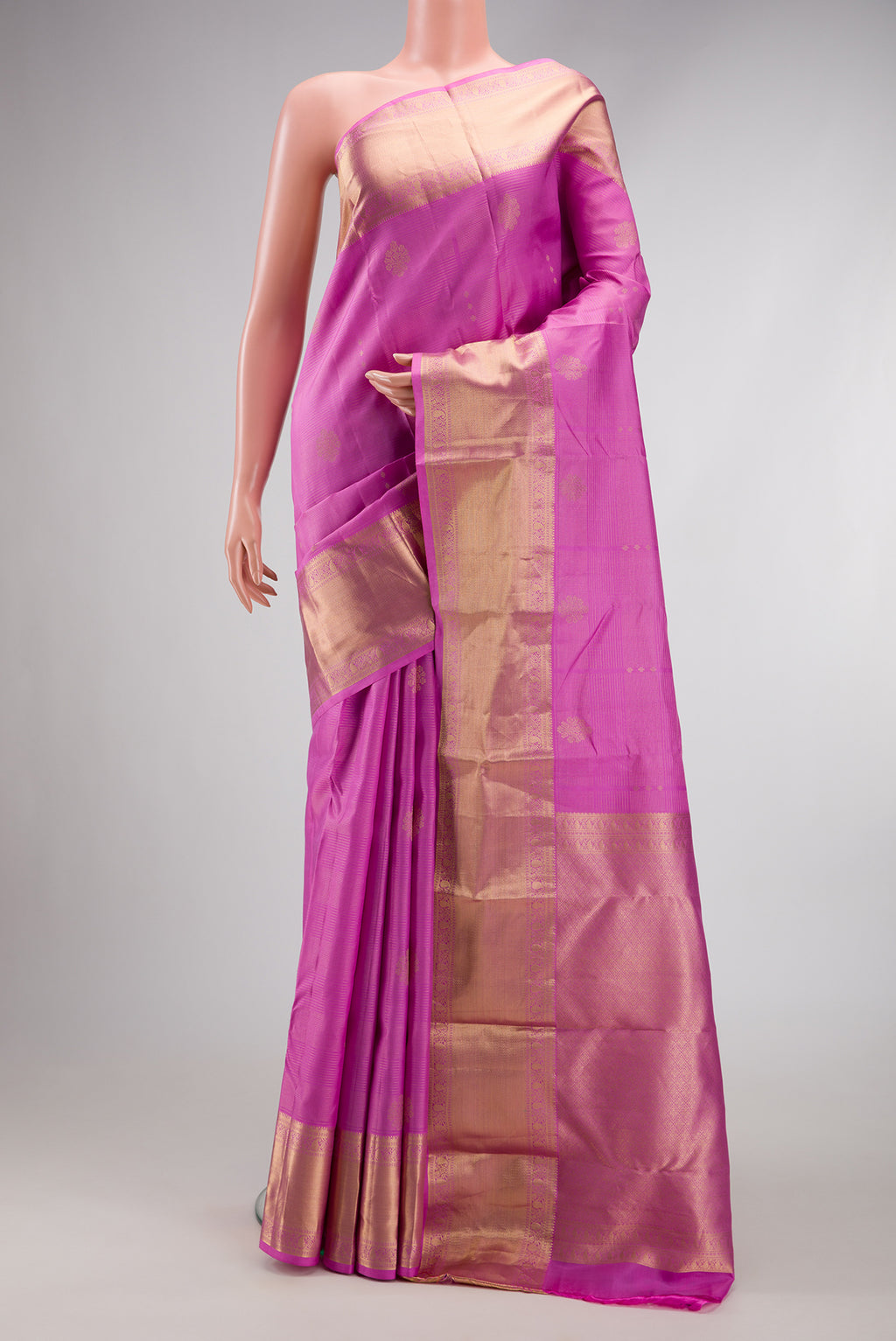 Lavender Dual Tone Kanjivaram Silk Saree with Zari Butta on the body and Zari Border.  displayed on a mannequin