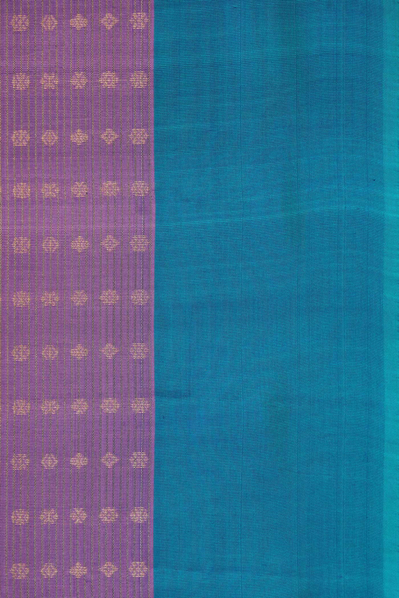 Border image of Purple Dual Tone Kanchipuram Silk Saree with Stripes on the body and Plain Border. 