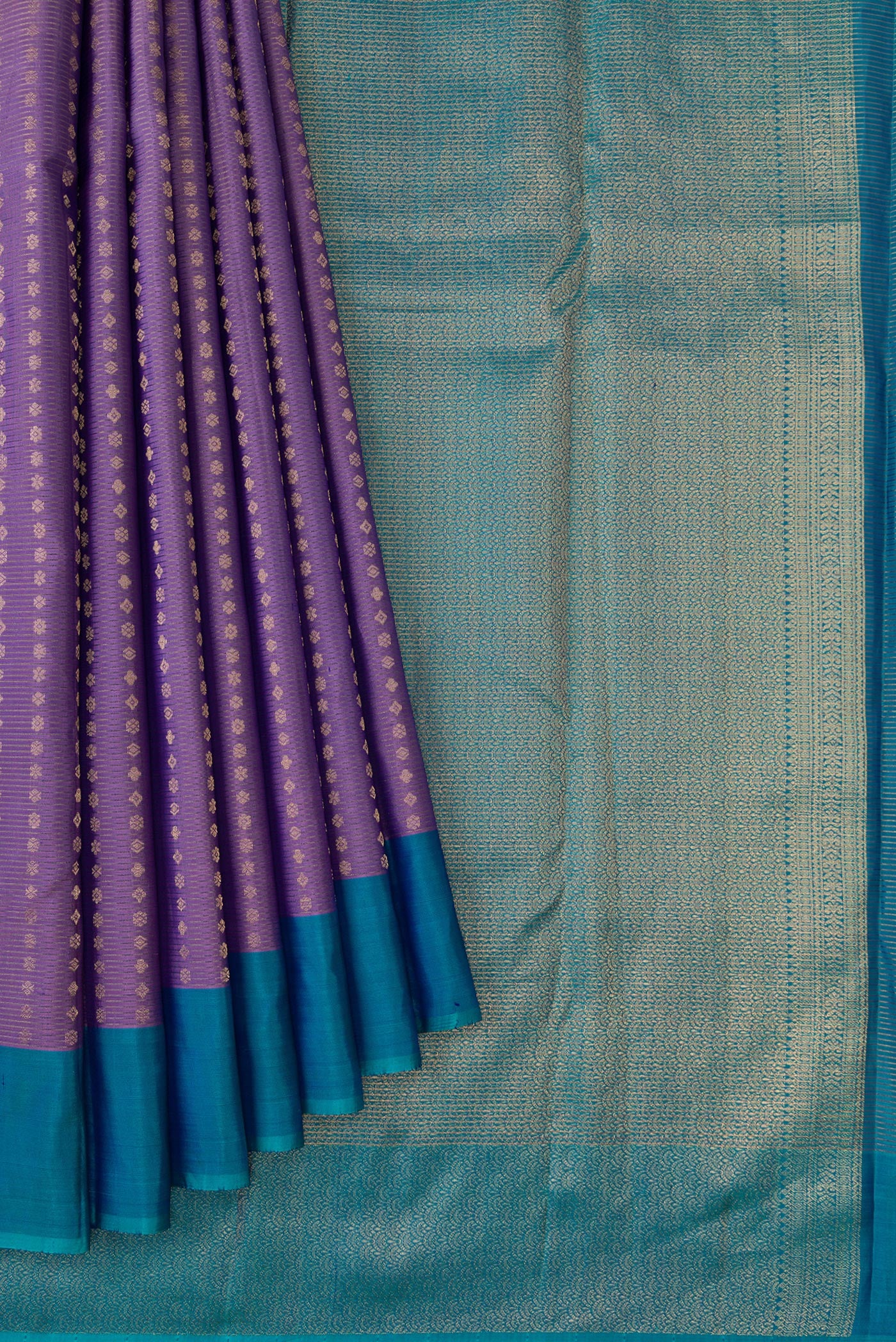 Pleats and pallu of Purple Dual Tone Kanchipuram Silk Saree with Stripes on the body and Plain Border. 