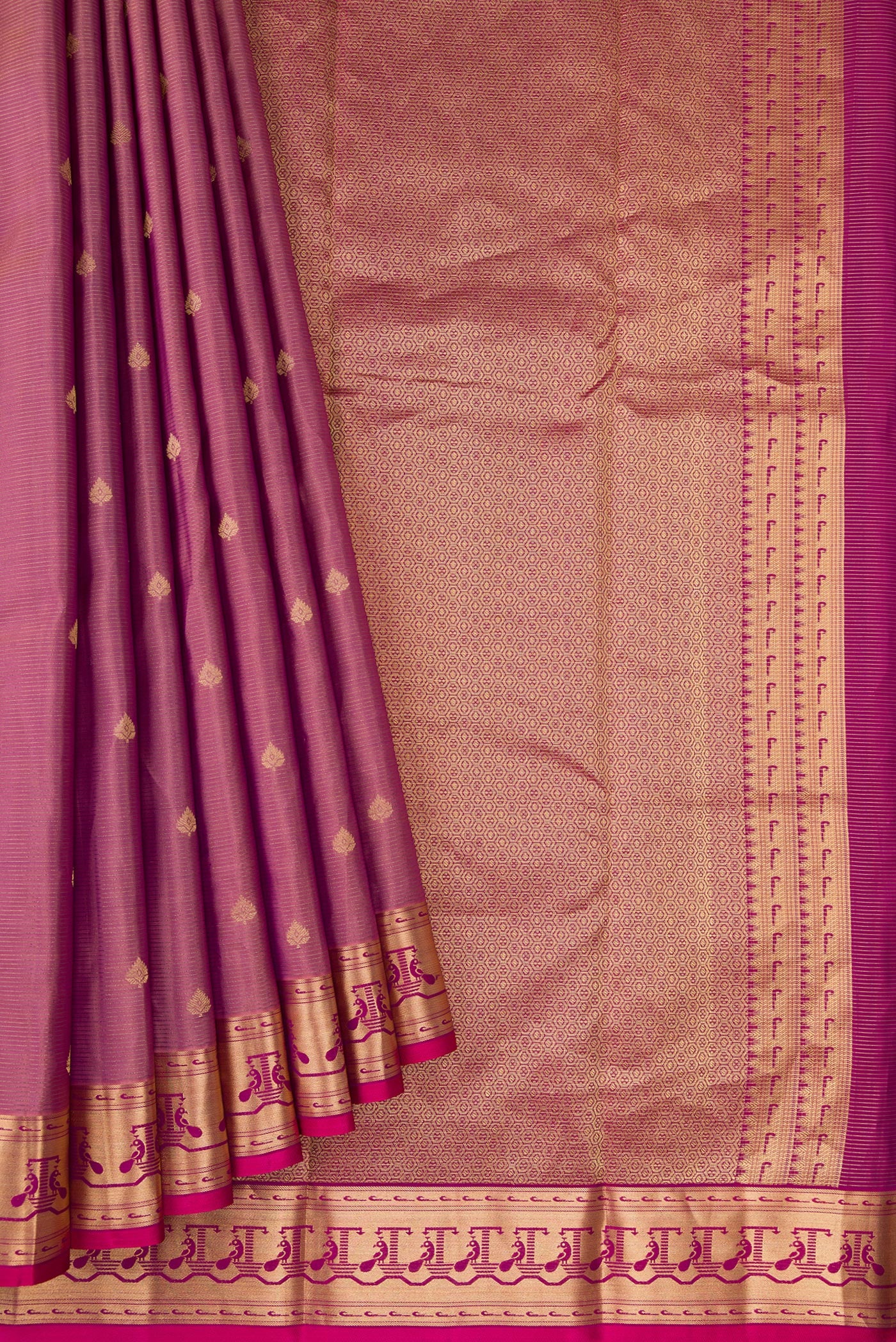 Pleats and pallu of Rose pink Dual Tone Kanchipuram Silk Saree with Zari Butta on the body and Zari Border. 