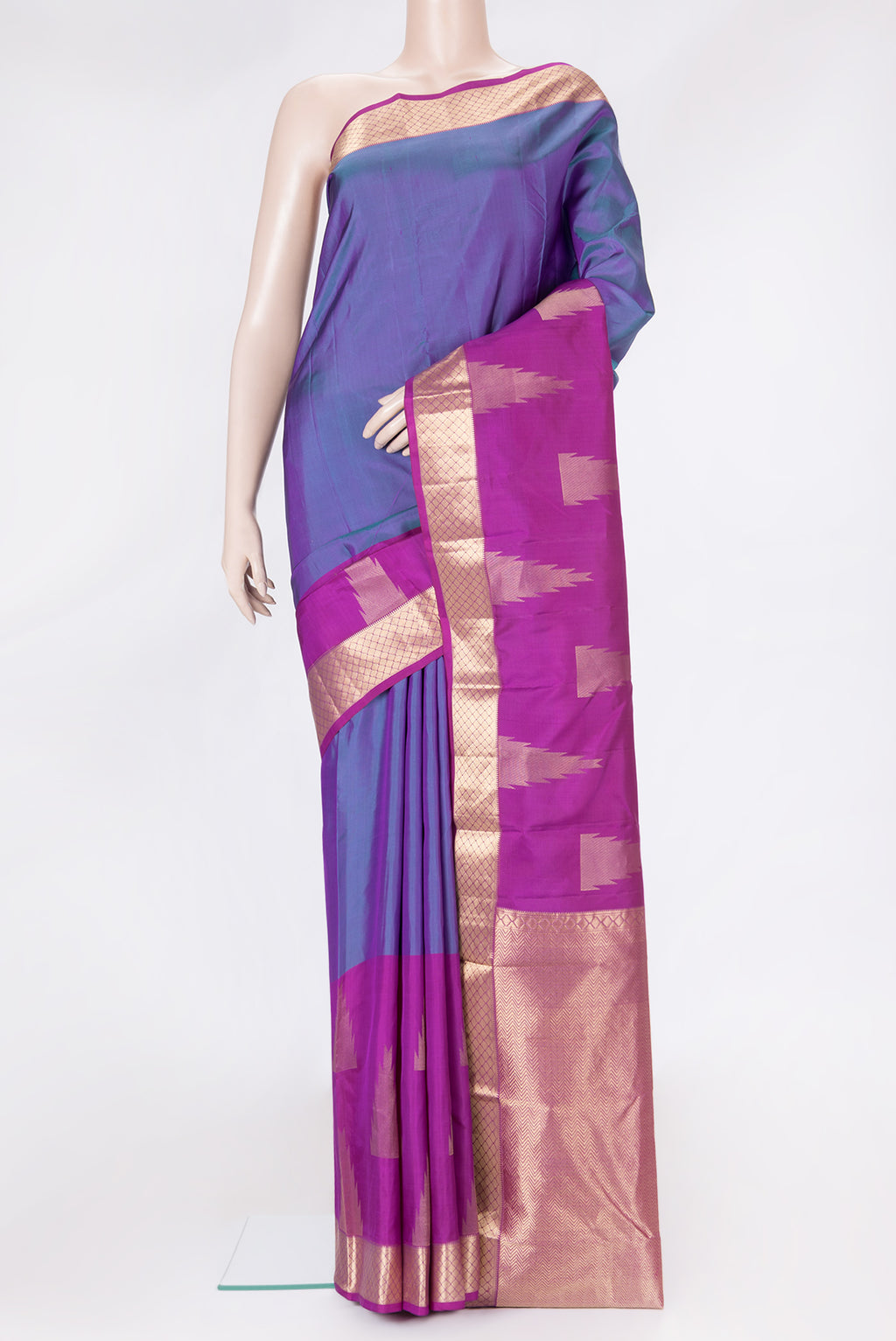 Peacock Blue Dual Tone Kanchipuram Silk Saree with Plain Body and Fancy Border.  displayed on a mannequin