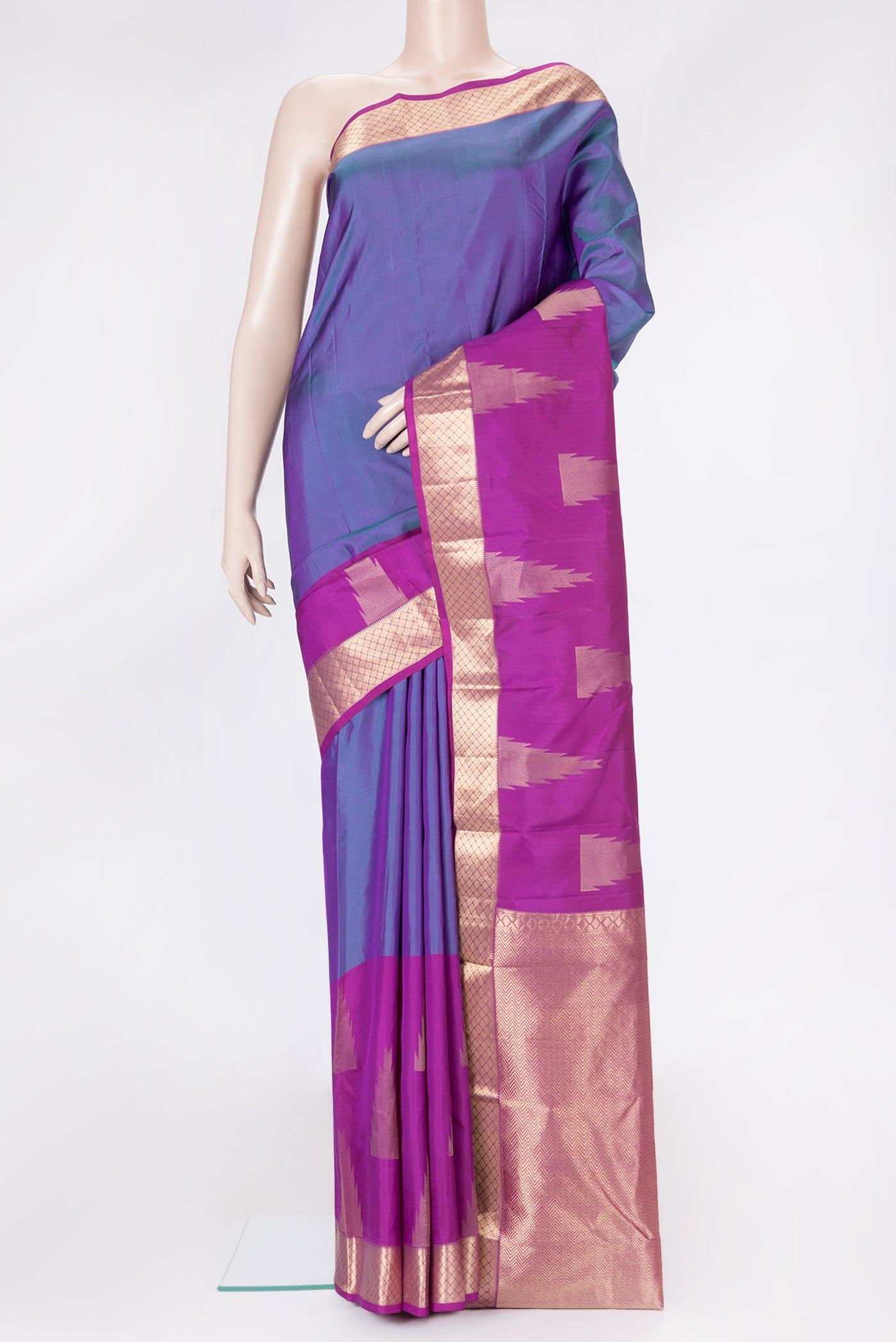 Peacock Blue Dual Tone Kanchipuram Silk Saree with Plain Body and Fancy Border.  displayed on a mannequin