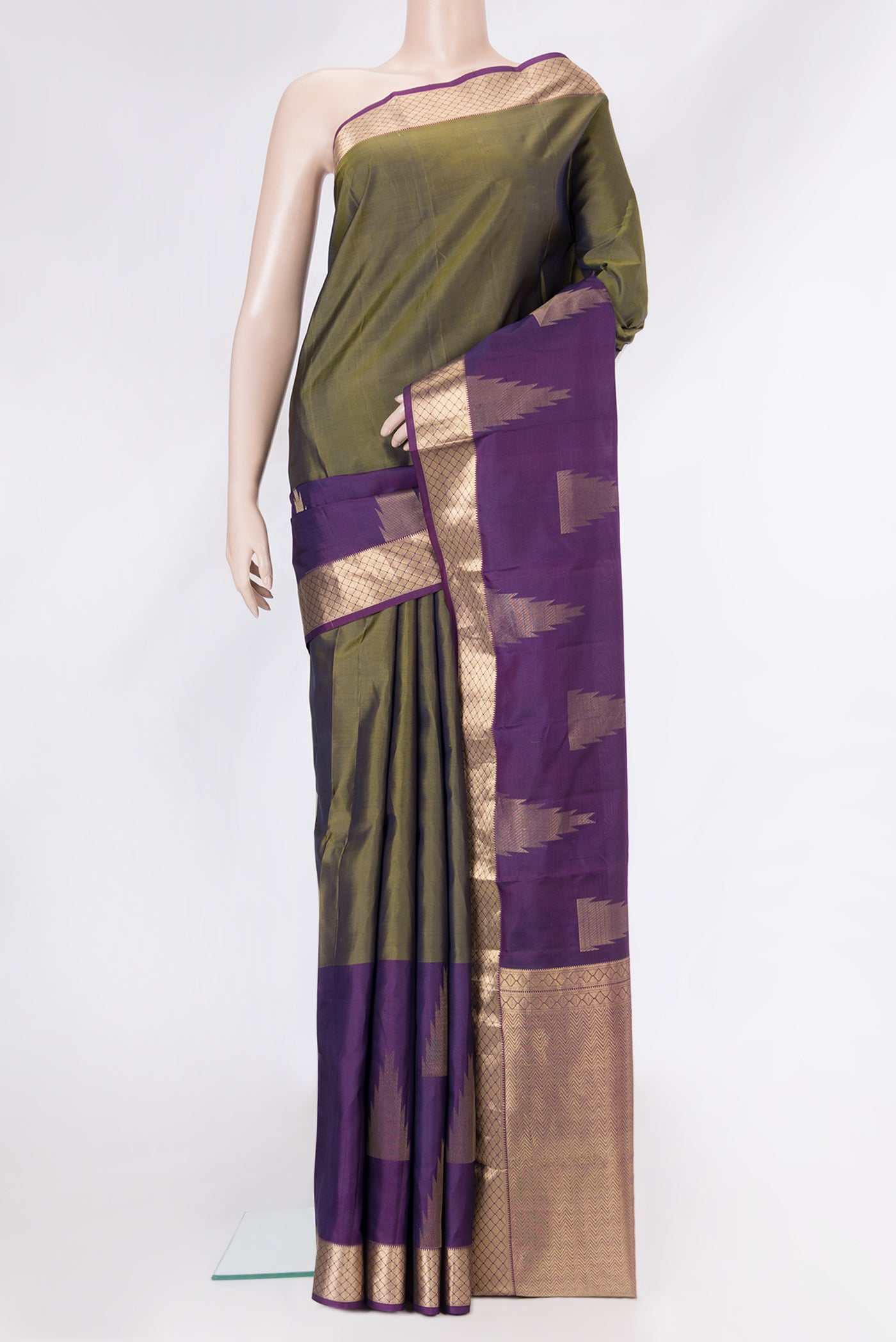 Mehandi Green Dual Tone Kanchipuram Silk Saree with Plain Body and Fancy Border.  displayed on a mannequin