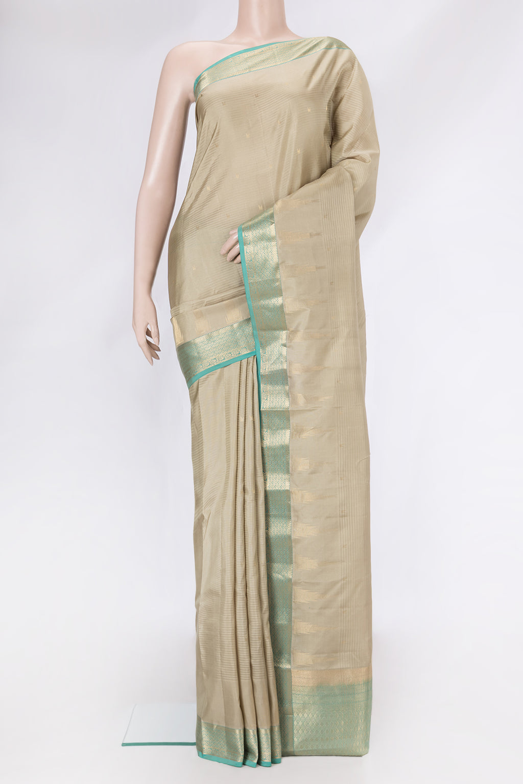 Beige Kanchipuram Silk Saree with Stripes on the body and Zari Border.  displayed on a mannequin
