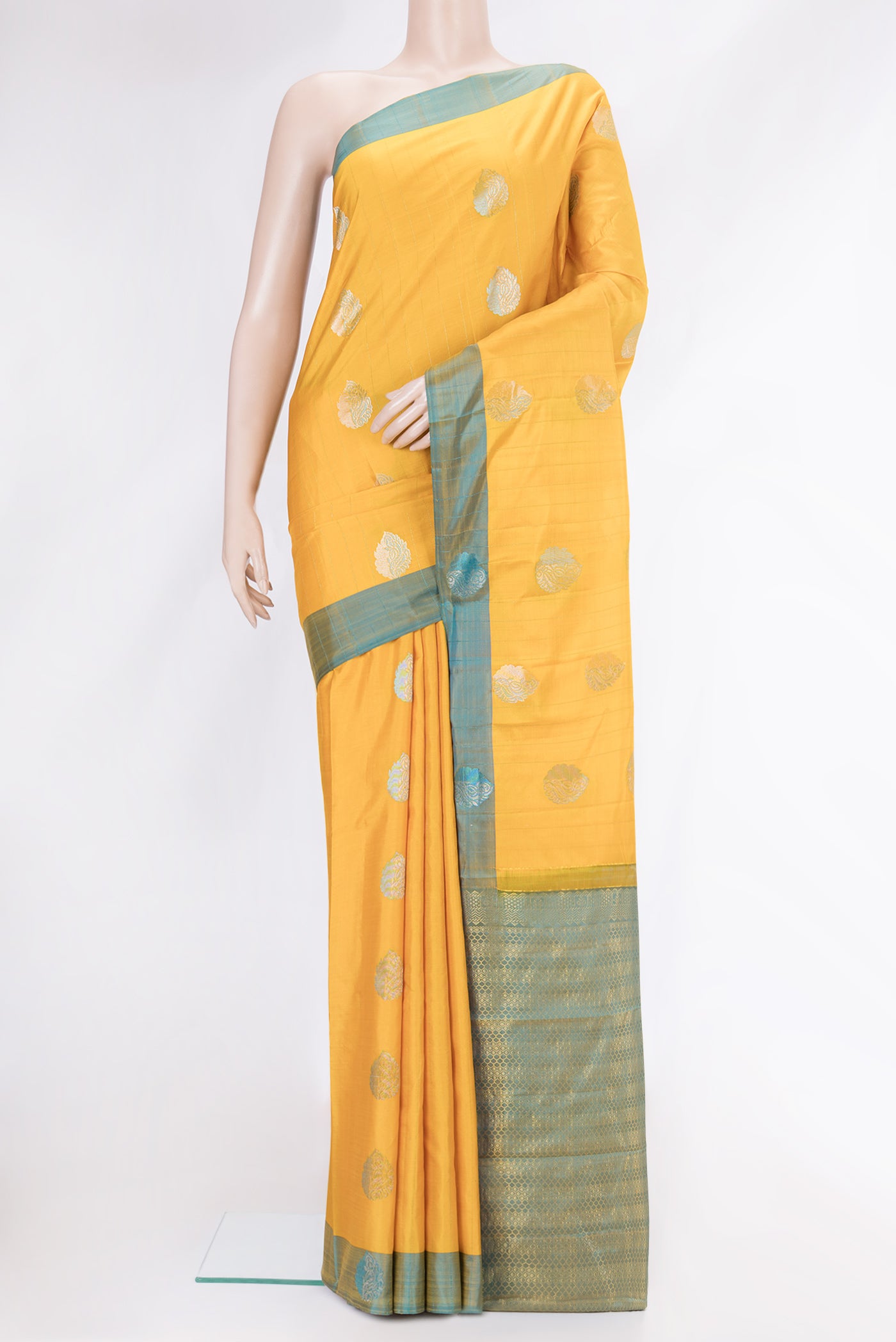 Yellow Dual Tone Kanchipuram Silk Saree with Stripes on the body and Fancy Border.  displayed on a mannequin