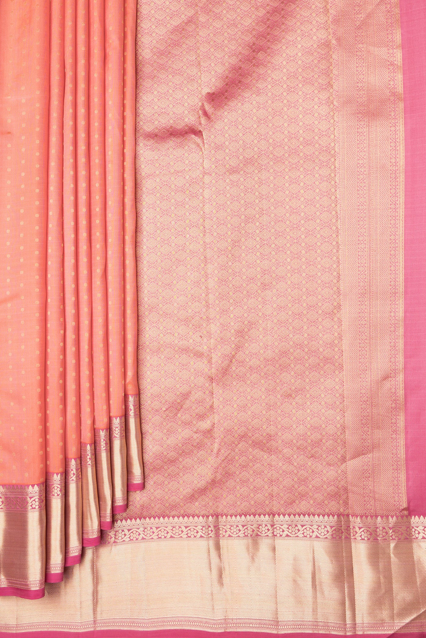 Pleats and pallu of Peach Dual Tone Kanchipuram Silk Saree with Zari Butta on the body and Zari Border. 