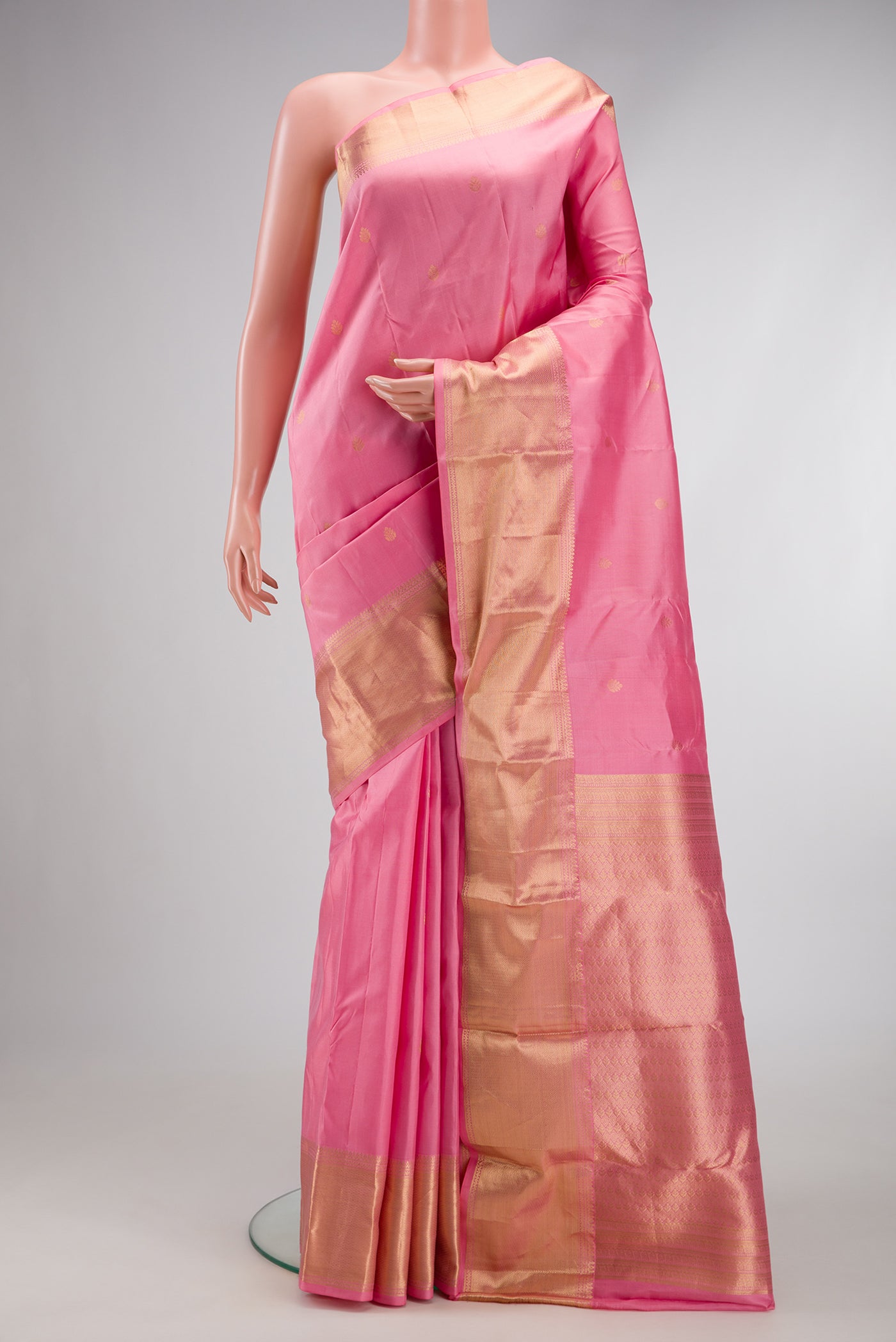 Pink Dual Tone Kanchipuram Silk Saree with Zari Butta on the body and Zari Border.  displayed on a mannequin