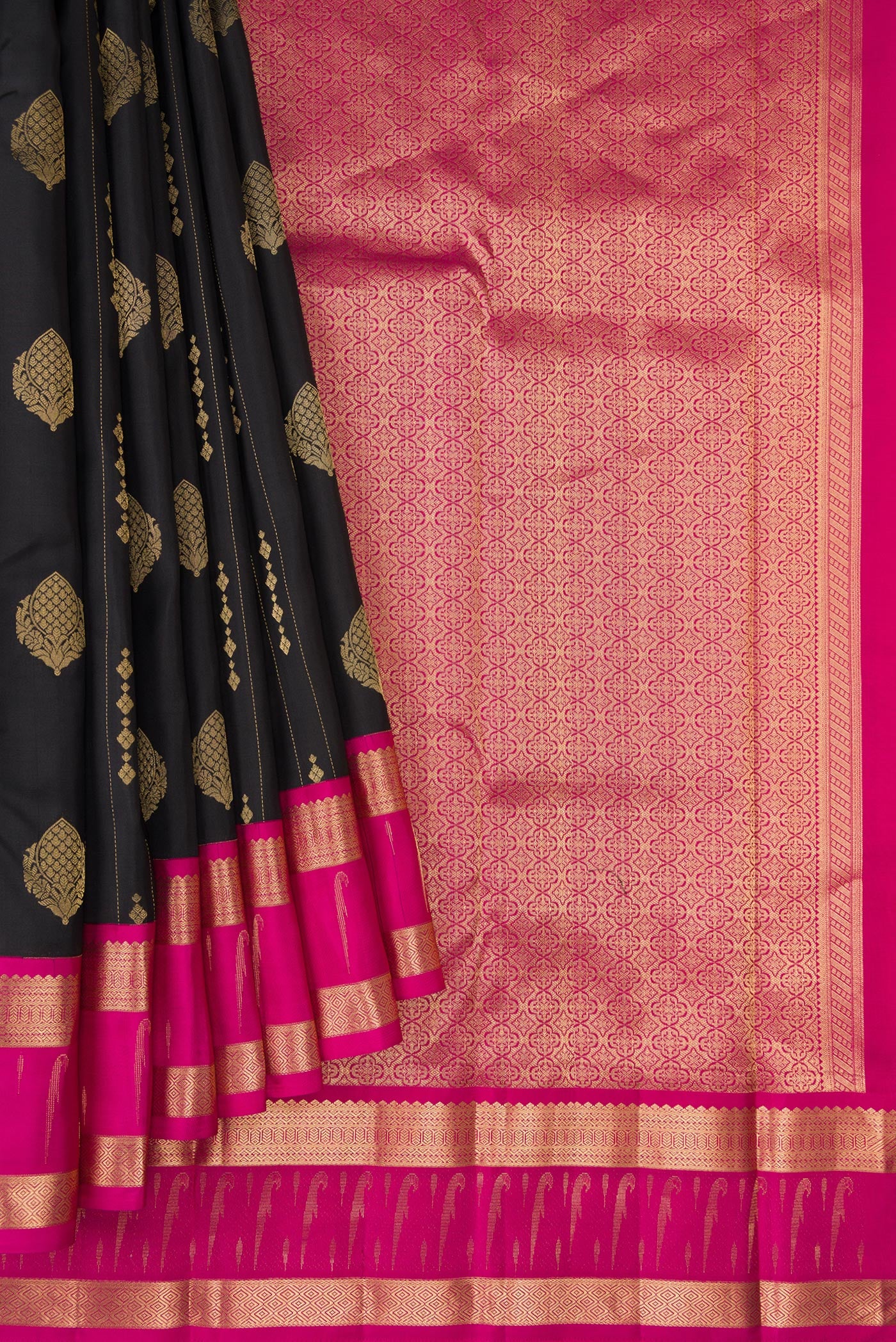 Pleats and pallu of Black Dual Tone Kanchipuram Silk Saree with Zari Butta on the body and Zari Border. 