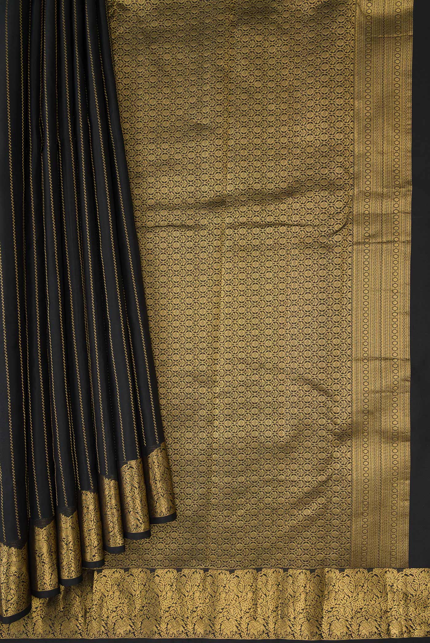 Pleats and pallu of Black Dual Tone Kanchipuram Silk Saree with Stripes on the body and Fancy Border. 