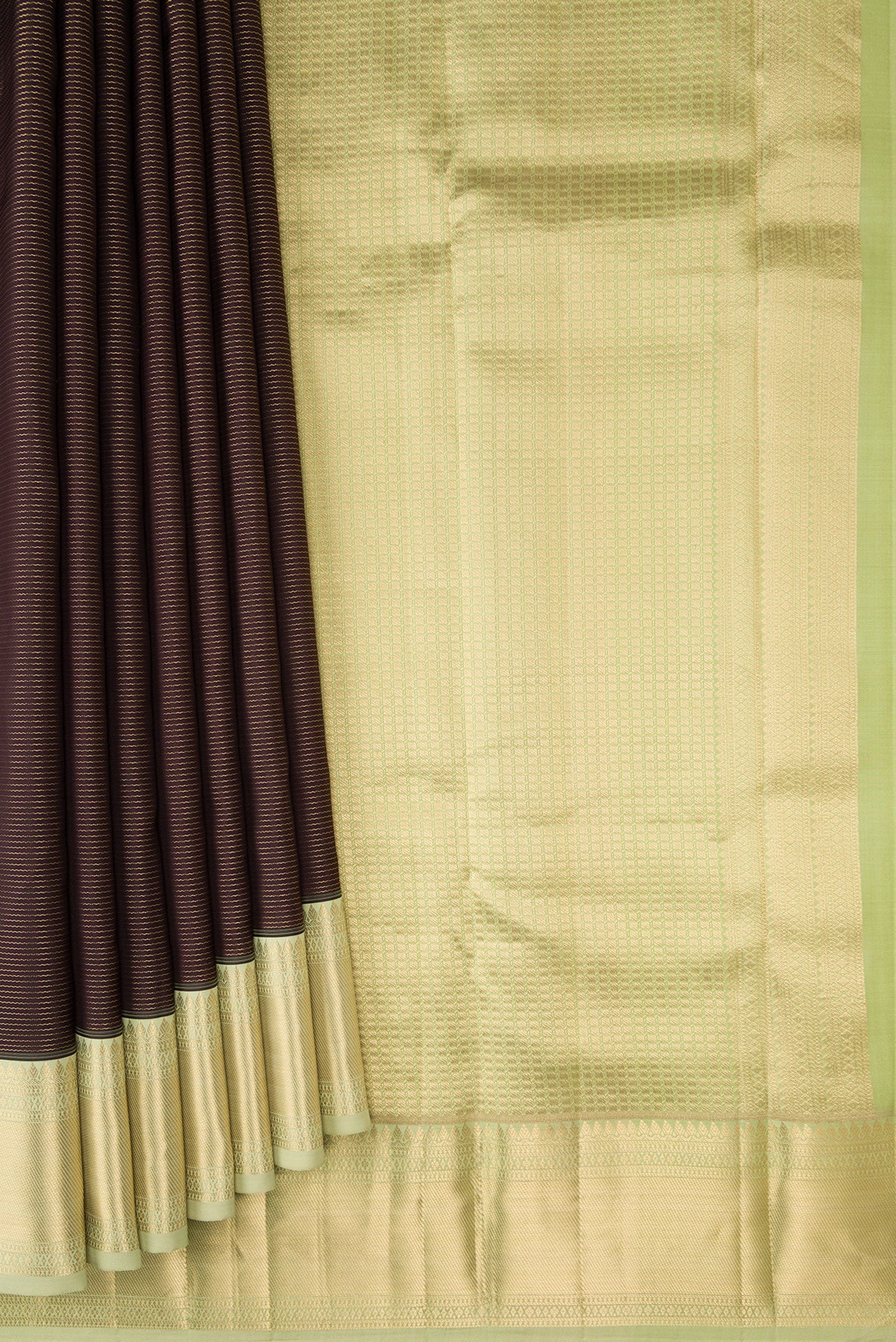 Pleats and pallu of Coffee Brown Dual Tone Kanchipuram Silk Saree with Stripes on the body and Zari Border. 