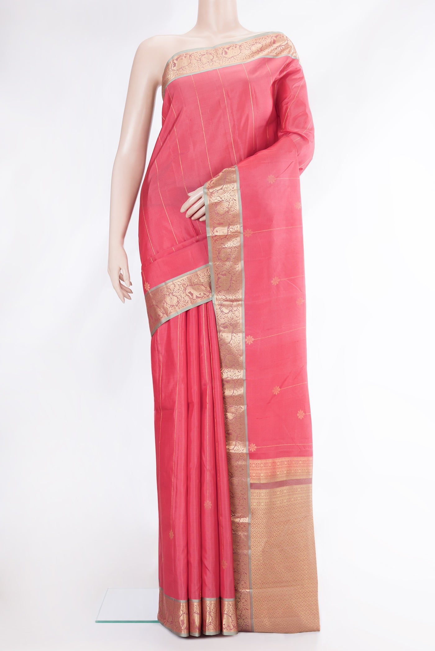 Pink Dual Tone Kanchipuram Silk Saree with Stripes on the body and Zari Border.  displayed on a mannequin