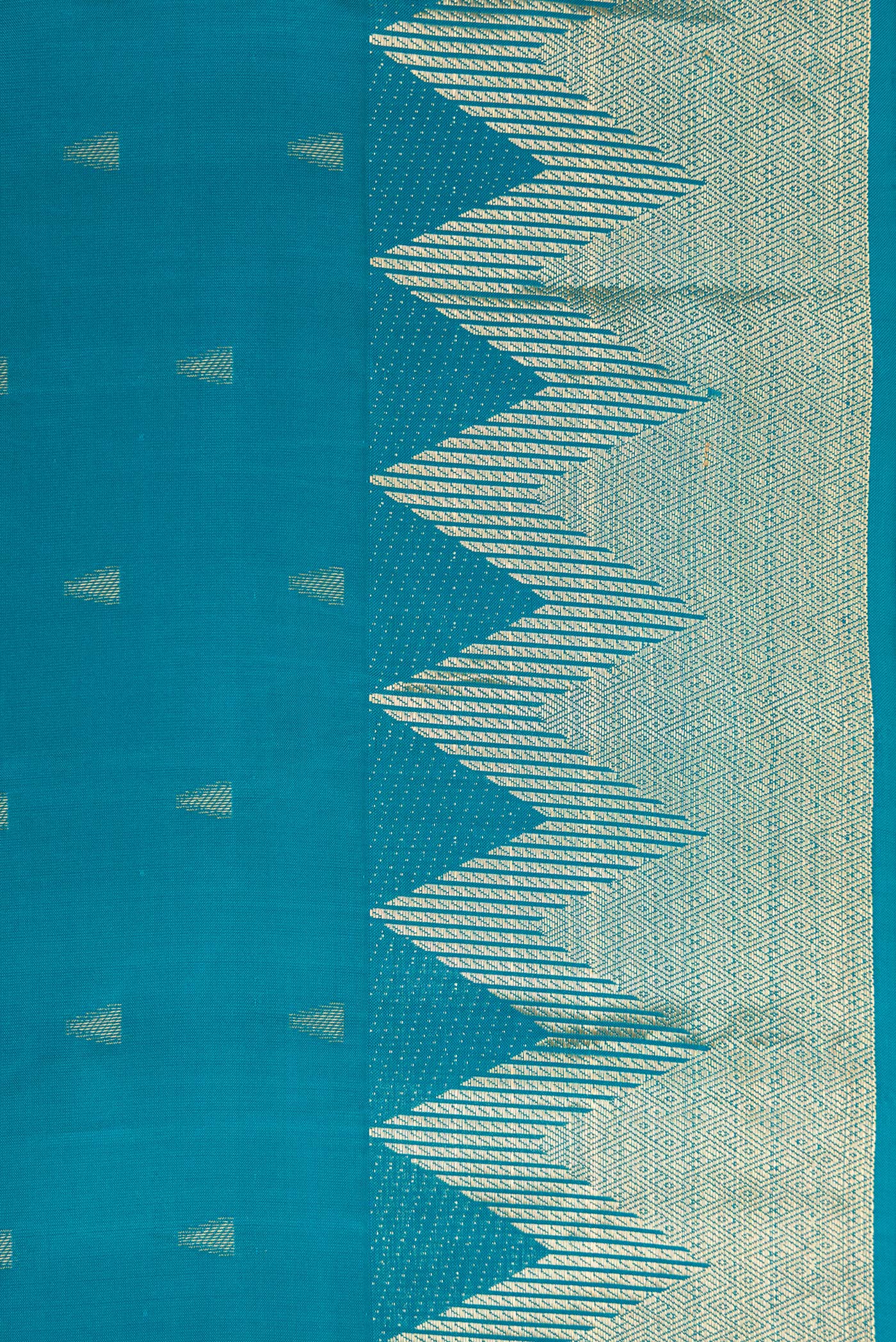 Border image of Peacock Blue Dual Tone Kanchipuram Silk Saree with Zari Butta on the body and Fancy Border. 