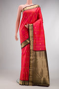 Coral Dual Tone Kanchipuram Silk Saree with Jacquard With Zari Butta on the body and Zari Border.  displayed on a mannequin