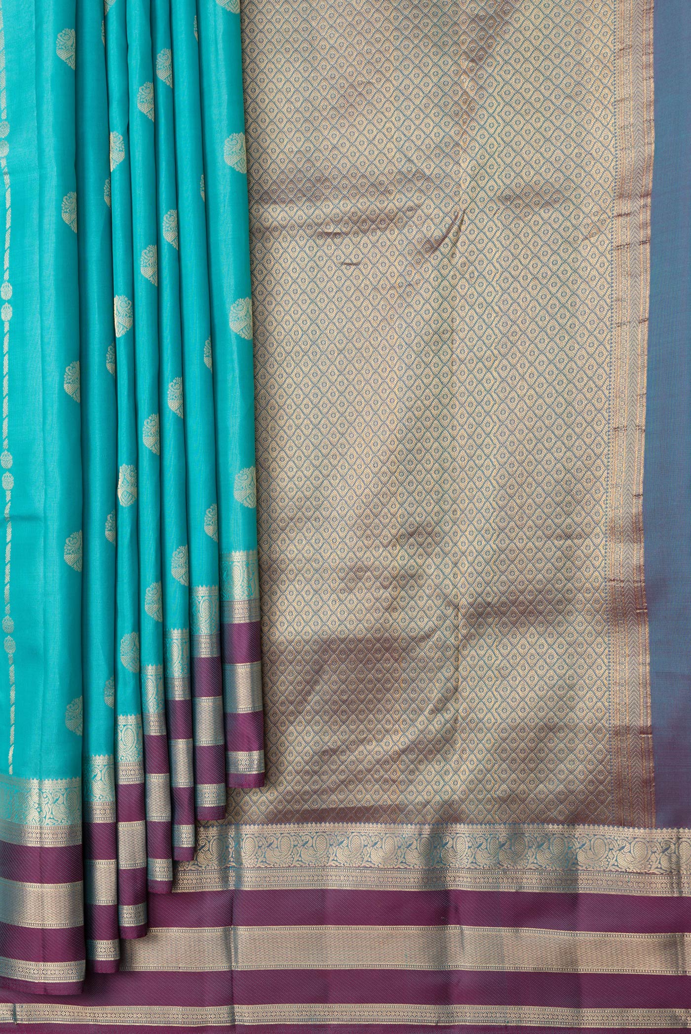 Pleats and pallu of Sky Blue Dual Tone Kanchipuram Silk Saree with Zari Butta on the body and Zari Border. 