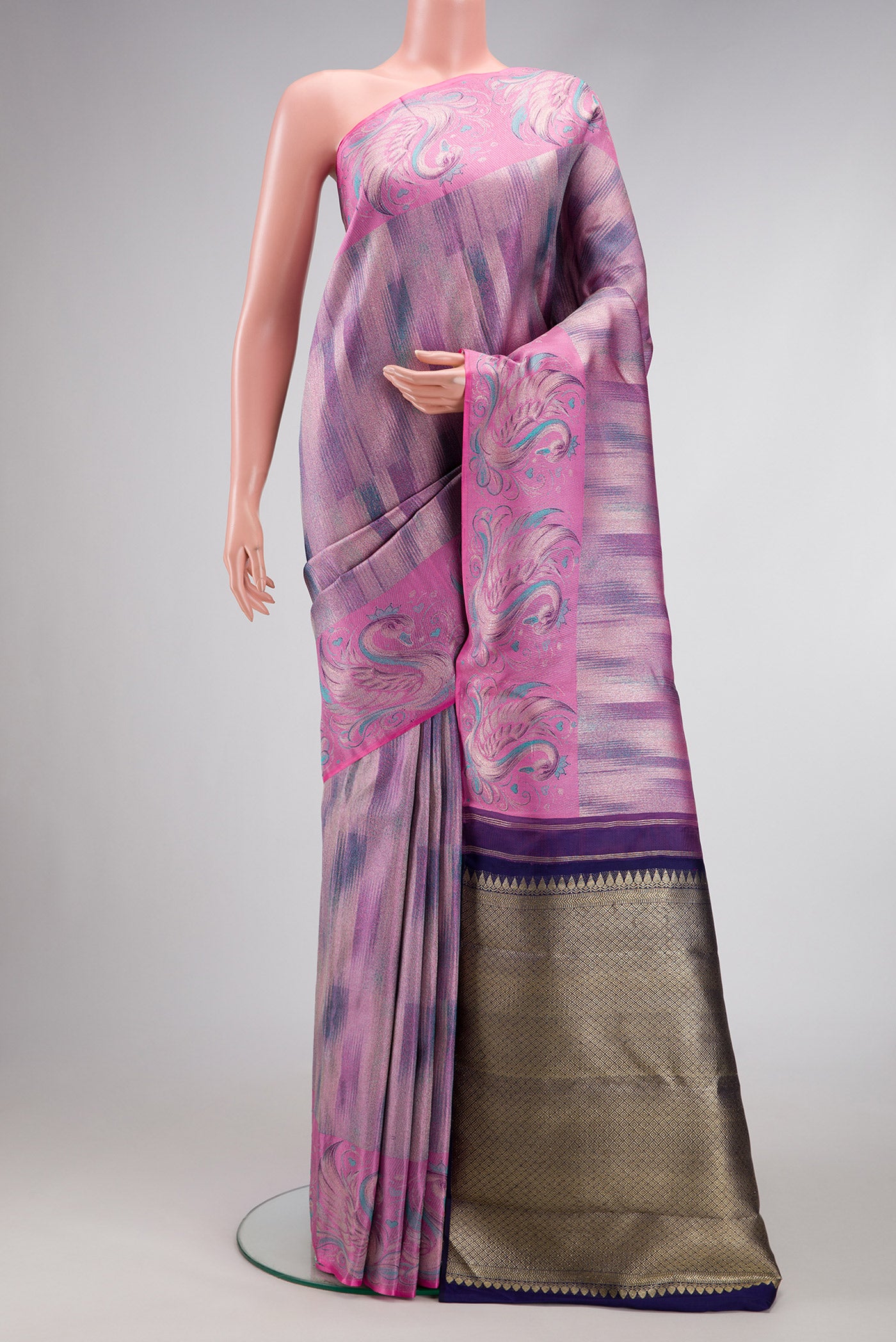 Lavender Dual Tone Kanjivaram Tissue Silk Saree with Zari Brocade on the body and Fancy Border.  displayed on a mannequin