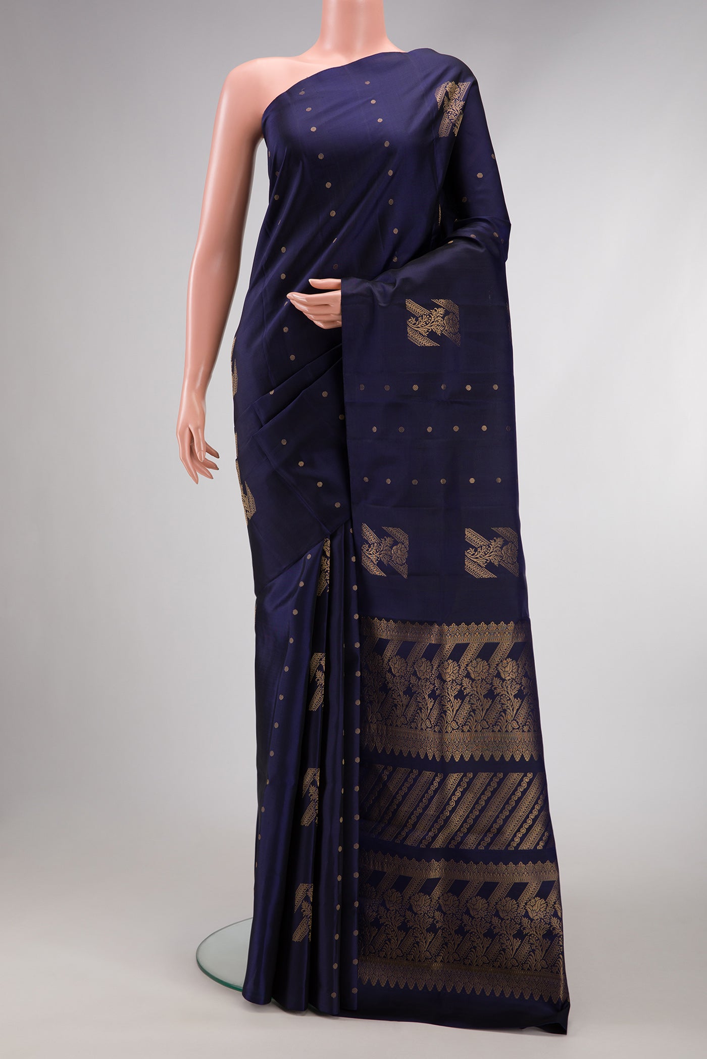 Navy Blue Dual Tone Soft Silk Saree with Zari Butta on the body and Without Border.  displayed on a mannequin