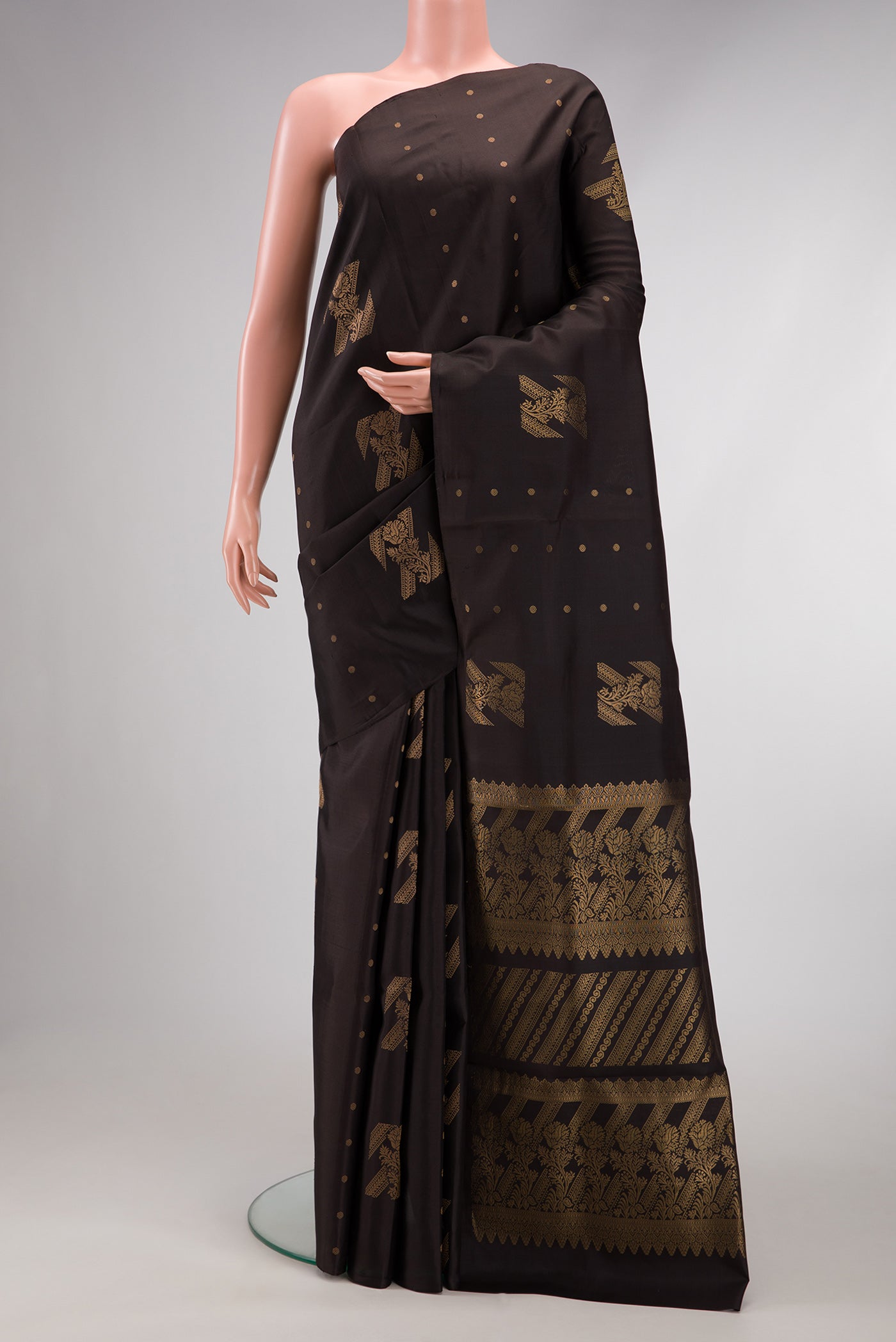 Coffee Brown Dual Tone Soft Silk Saree with Zari Butta on the body and Without Border.  displayed on a mannequin