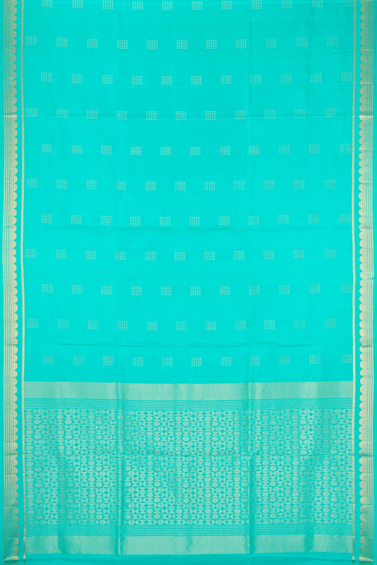 Flat view of Sea Green Dual Tone Soft Silk Saree with Zari Butta on the body and Zari Border. 