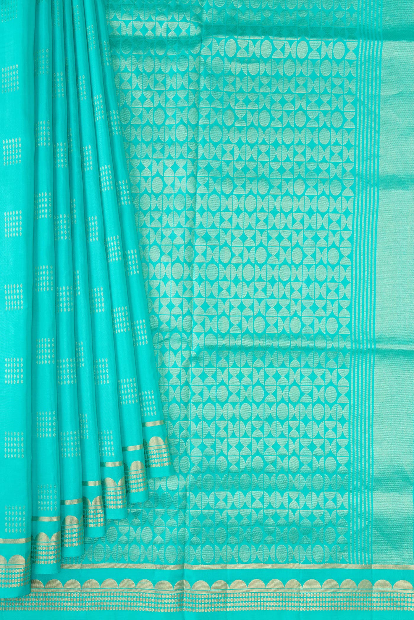 Pleats and pallu of Sea Green Dual Tone Soft Silk Saree with Zari Butta on the body and Zari Border. 