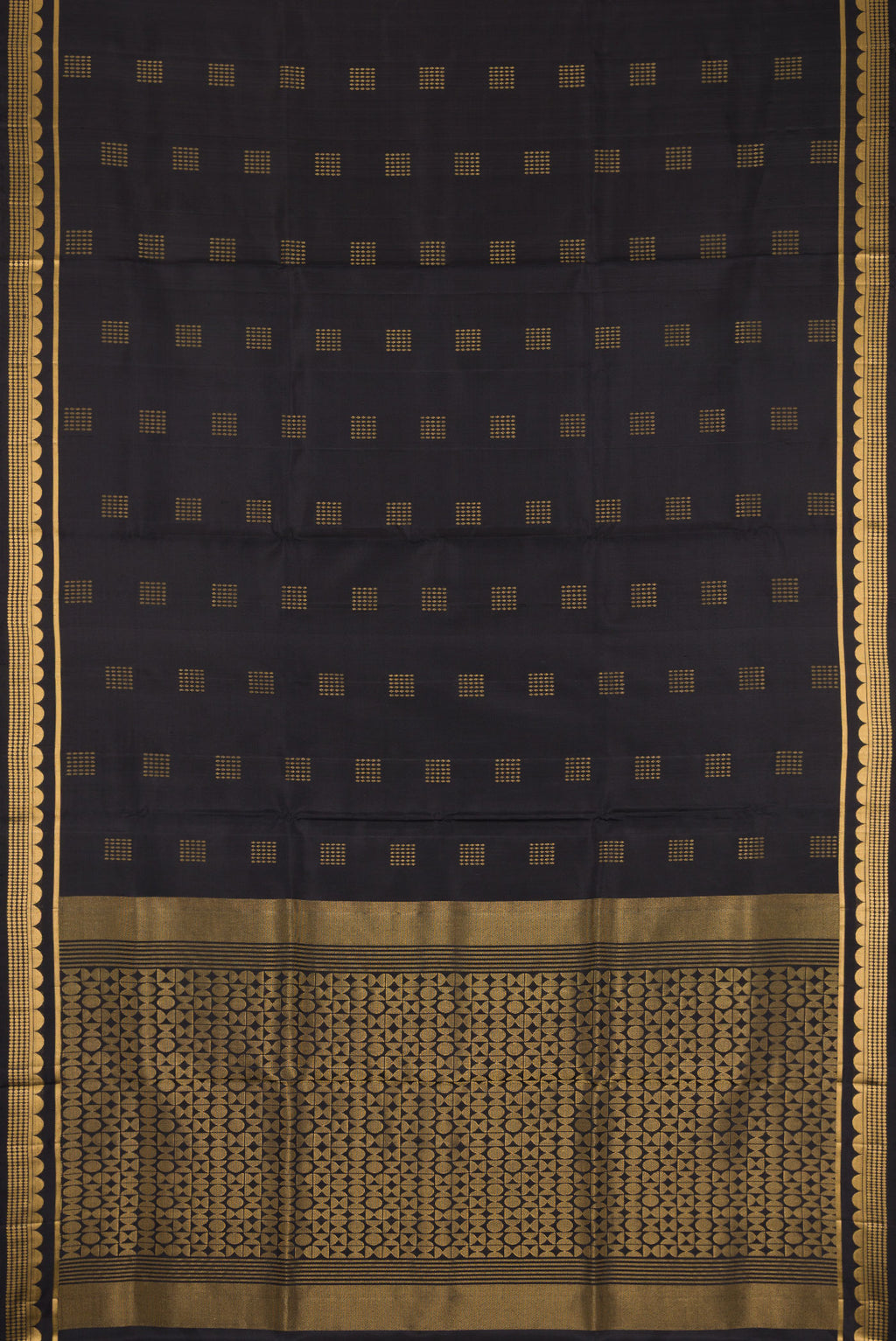 Flat view of Black Dual Tone Soft Silk Saree with Zari Butta on the body and Fancy Border. 