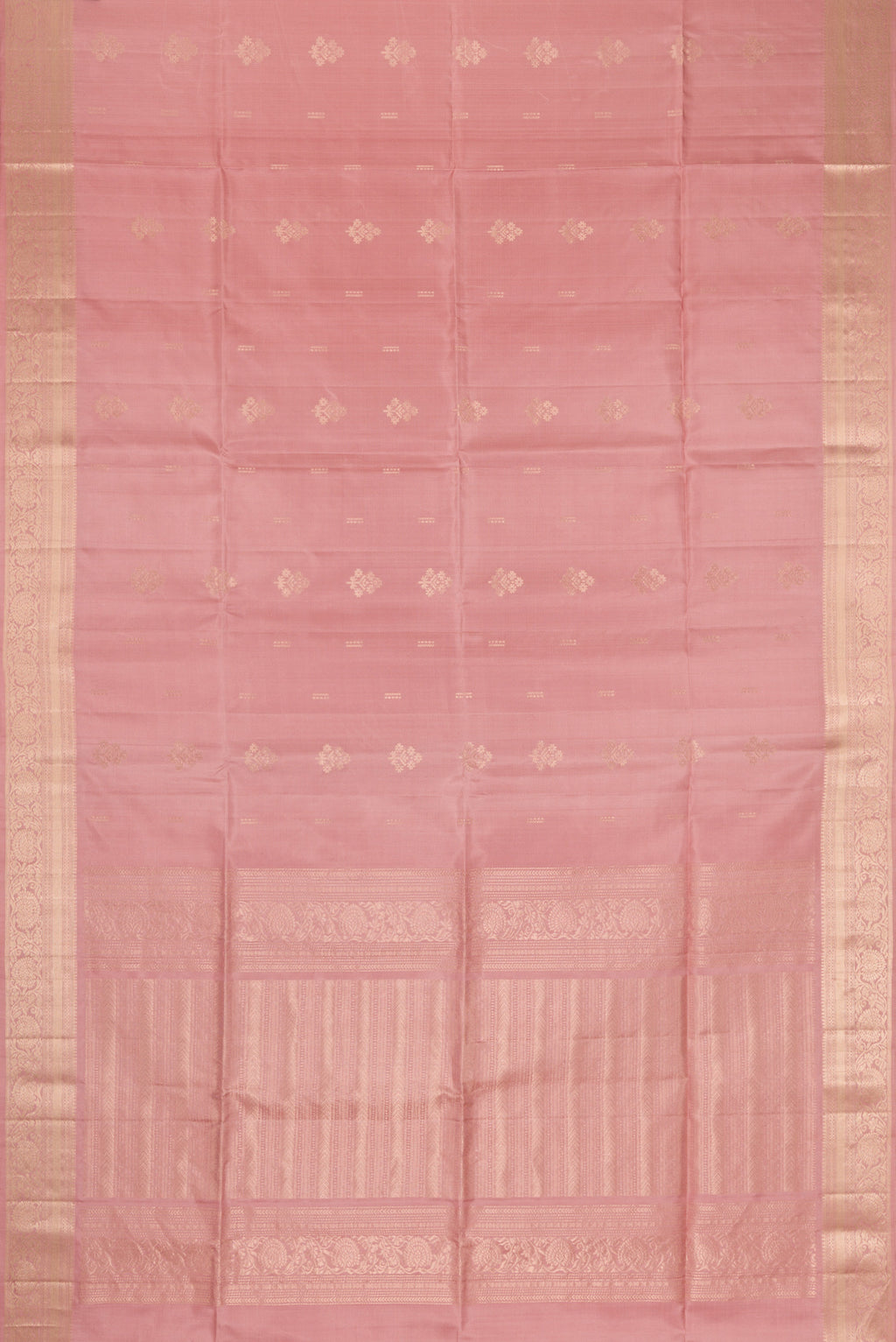 Flat view of Rose Gold Dual Tone Soft Silk Saree with Zari Butta on the body and Zari Border. 