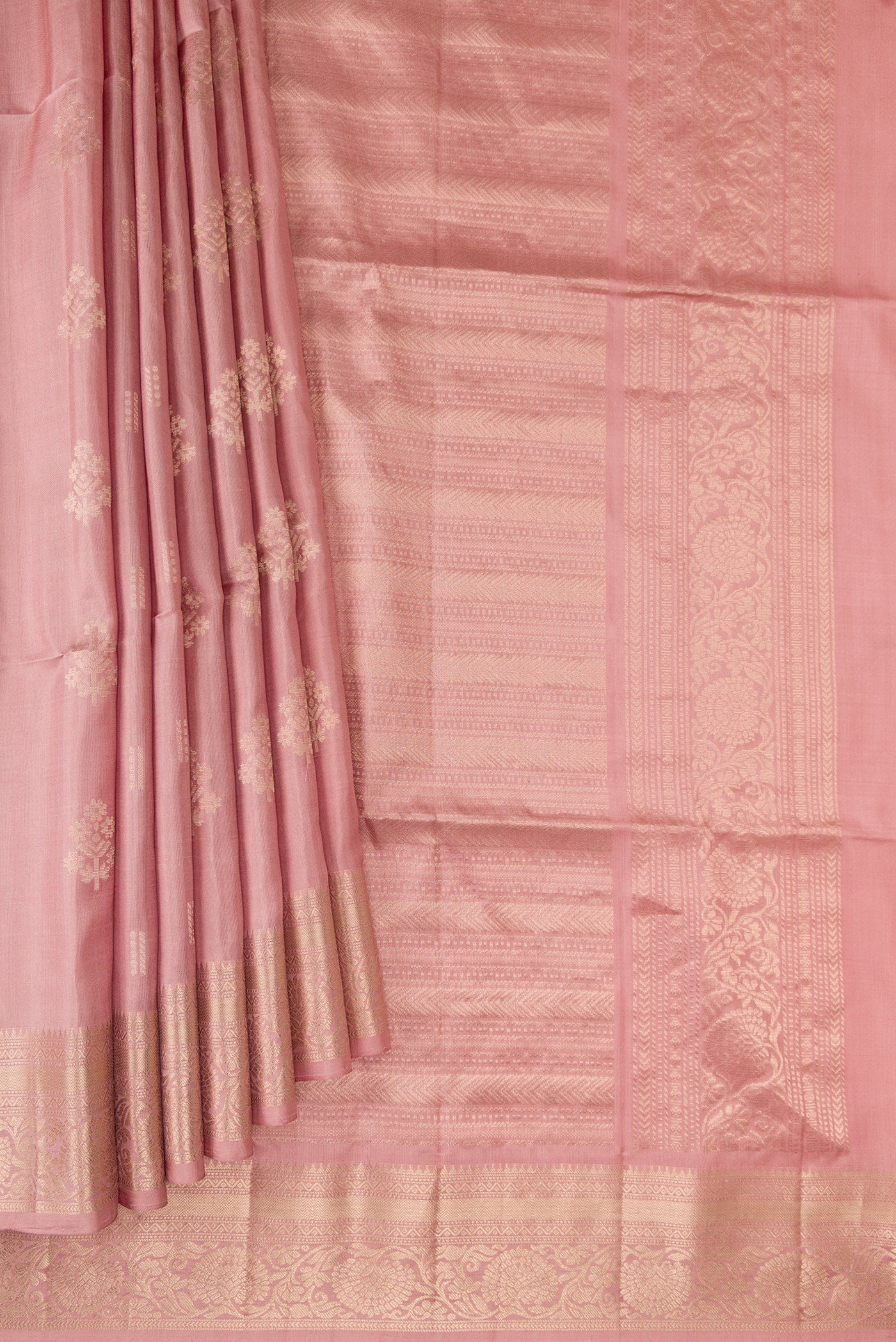 Pleats and pallu of Rose Gold Dual Tone Soft Silk Saree with Zari Butta on the body and Zari Border. 