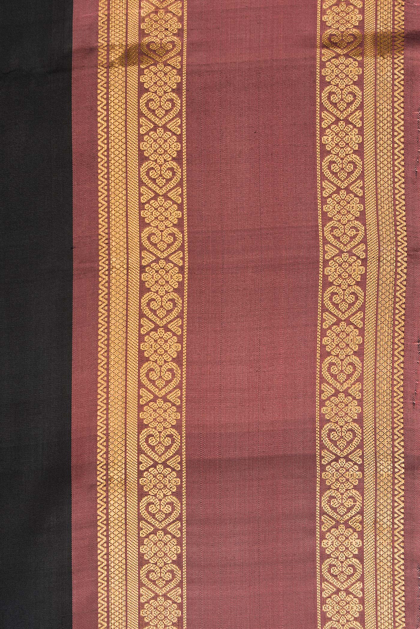 Border image of Black Dual Tone Soft Silk Saree with Zari Butta on the body and Zari Border. 