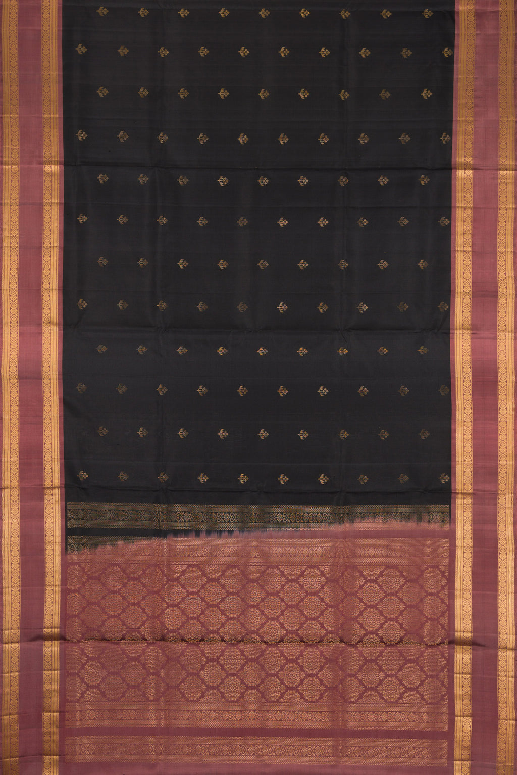 Flat view of Black Dual Tone Soft Silk Saree with Zari Butta on the body and Zari Border. 