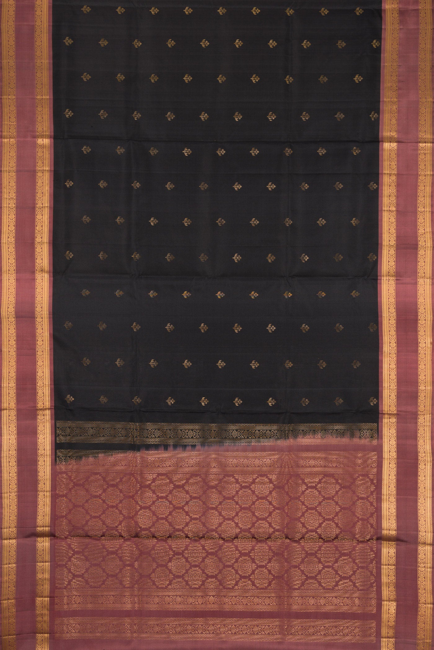 Flat view of Black Dual Tone Soft Silk Saree with Zari Butta on the body and Zari Border. 
