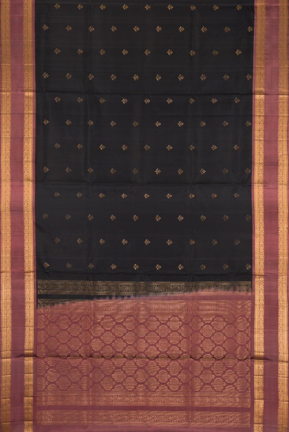 Flat view of Black Dual Tone Soft Silk Saree with Zari Butta on the body and Zari Border. 