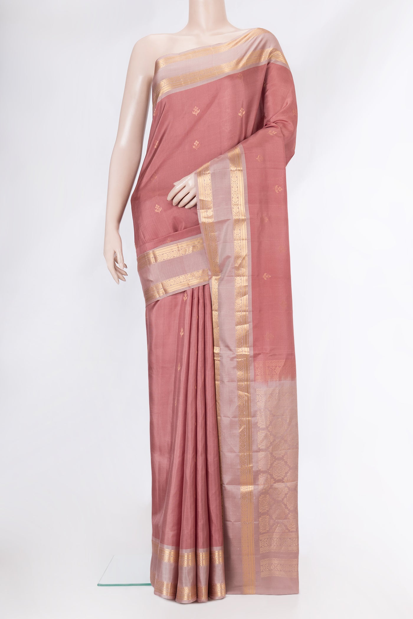Rose Gold Dual Tone Soft Silk Saree with Zari Butta on the body and Zari Border.  displayed on a mannequin