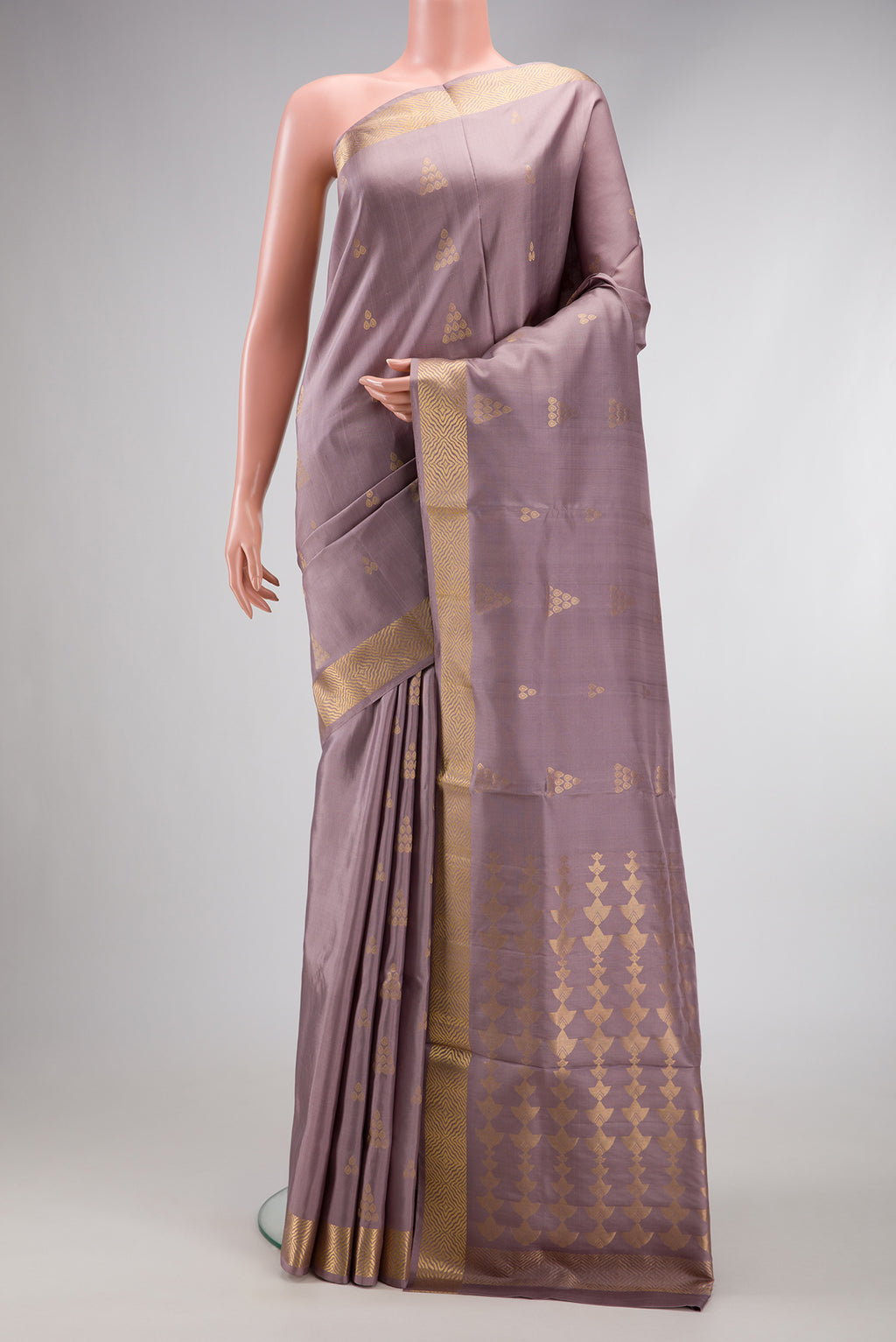 Rose Gold Dual Tone Soft Silk Saree with Zari Butta on the body and Zari Border.  displayed on a mannequin