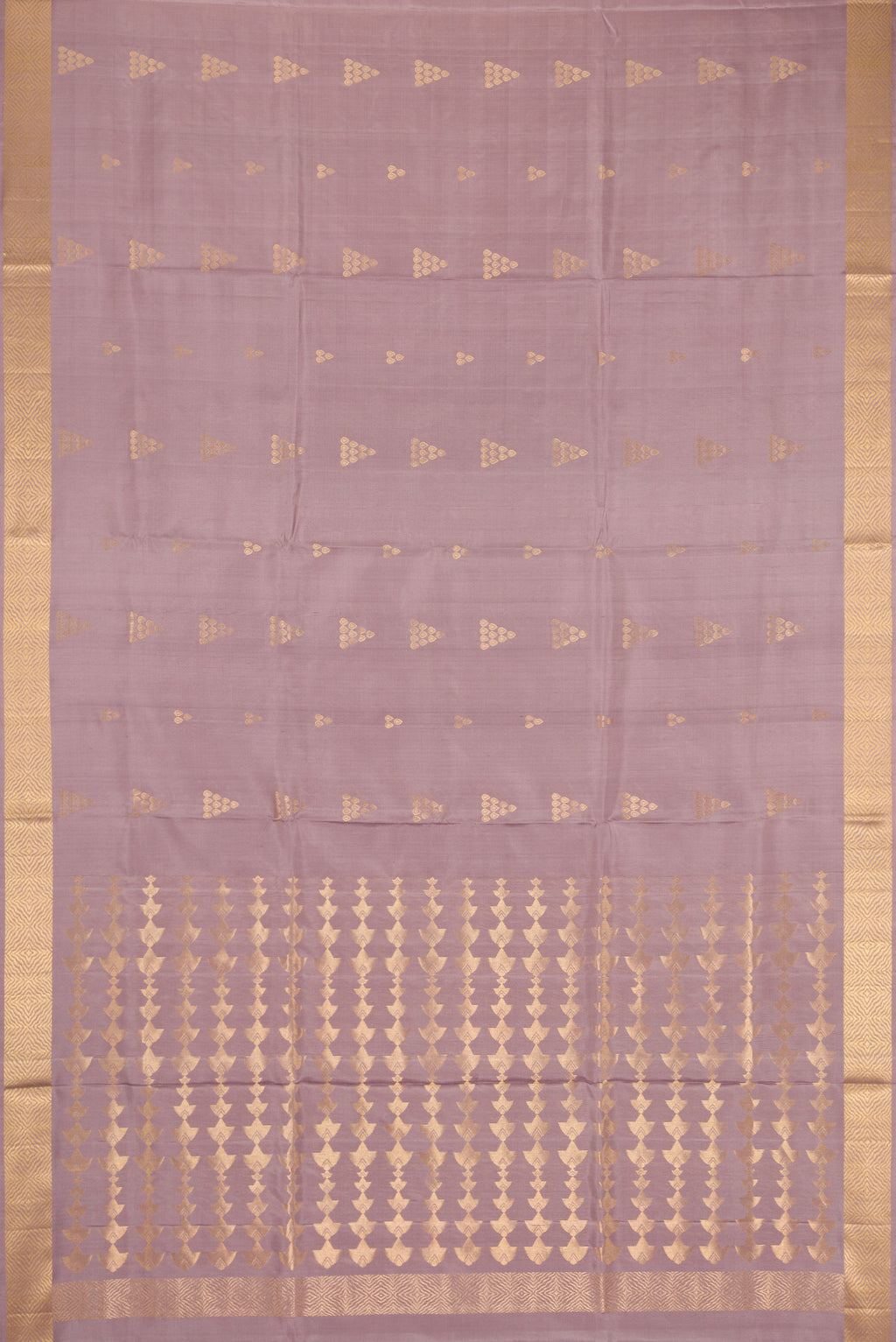 Flat view of Rose Gold Dual Tone Soft Silk Saree with Zari Butta on the body and Zari Border. 