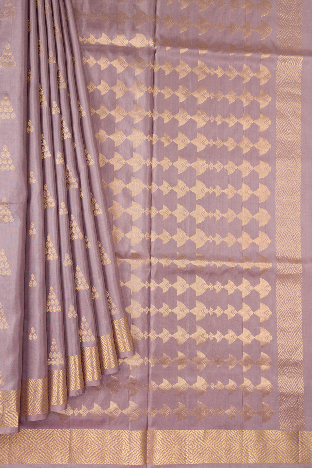 Pleats and pallu of Rose Gold Dual Tone Soft Silk Saree with Zari Butta on the body and Zari Border. 