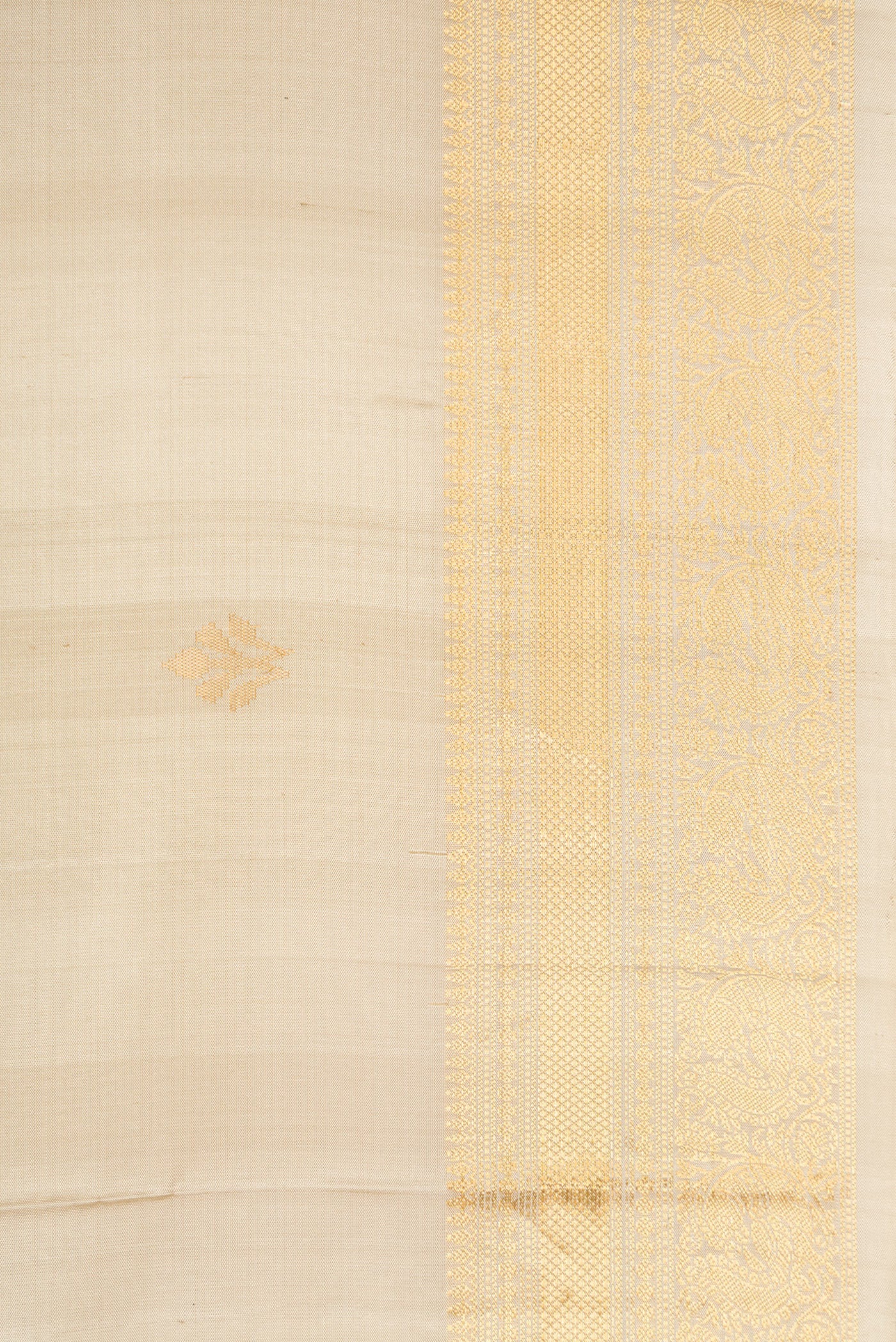 Border image of Beige Dual Tone Soft Silk Saree with Zari Butta on the body and Zari Border. 
