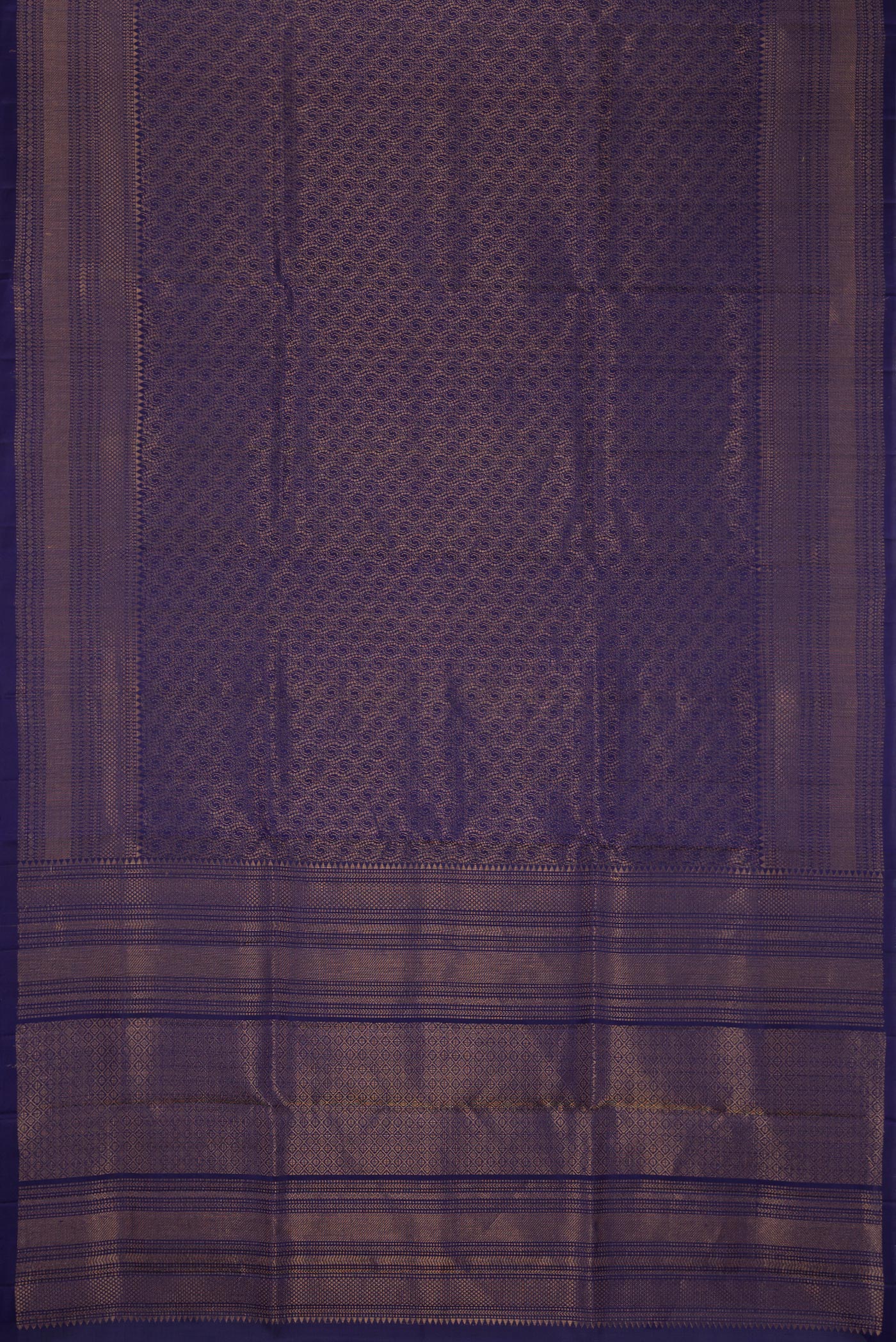 Flat view of Navy Blue Dual Tone Soft Silk Saree with Zari Brocade on the body and Zari Border. 