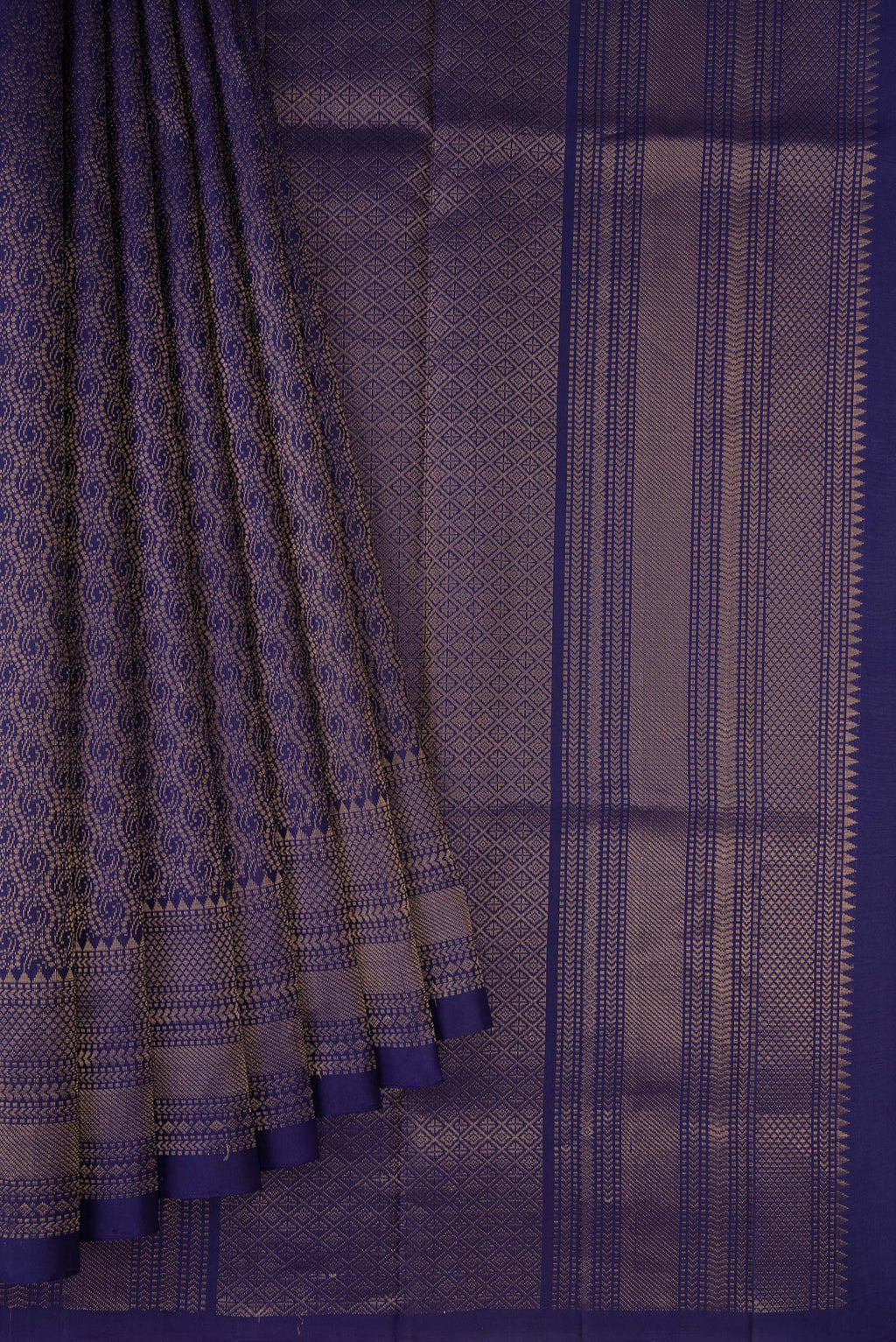 Pleats and pallu of Navy Blue Dual Tone Soft Silk Saree with Zari Brocade on the body and Zari Border. 