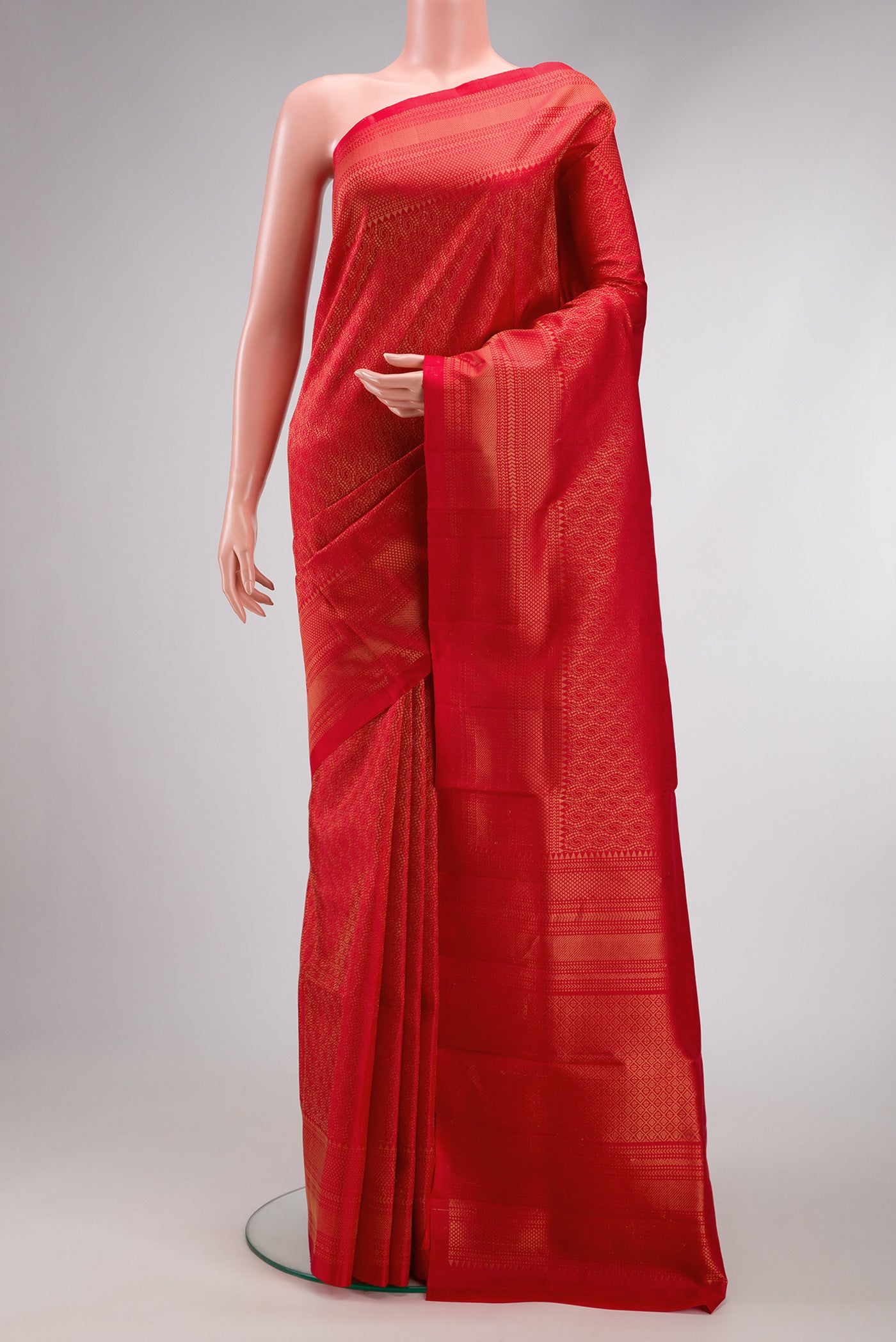Red Dual Tone Soft Silk Saree with Zari Brocade on the body and Zari Border.  displayed on a mannequin