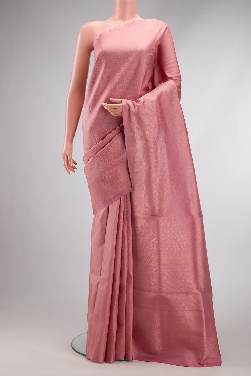 Rose Gold Dual Tone Soft Silk Saree with Zari Brocade on the body and Zari Border.  displayed on a mannequin