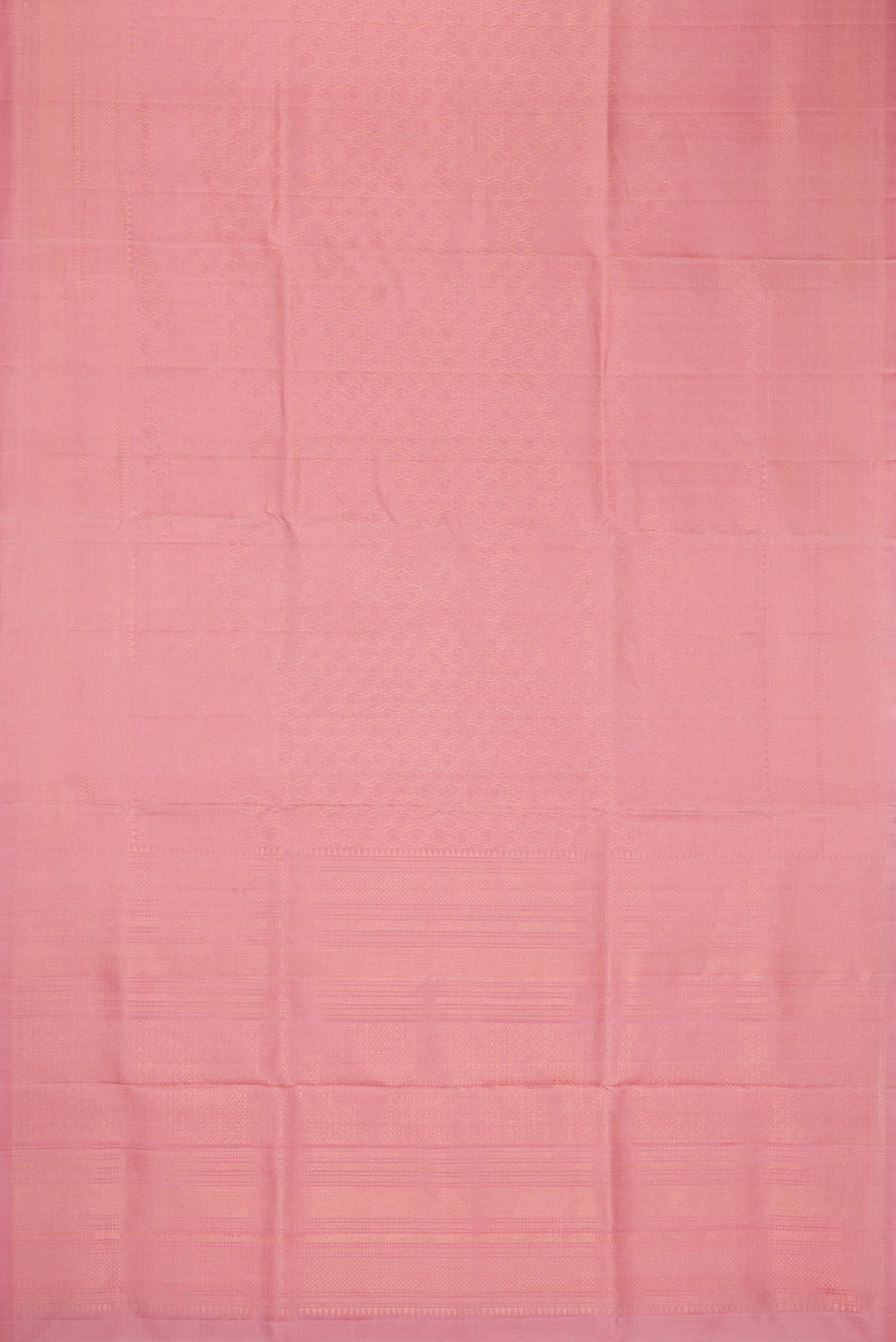 Flat view of Rose Gold Dual Tone Soft Silk Saree with Zari Brocade on the body and Zari Border. 