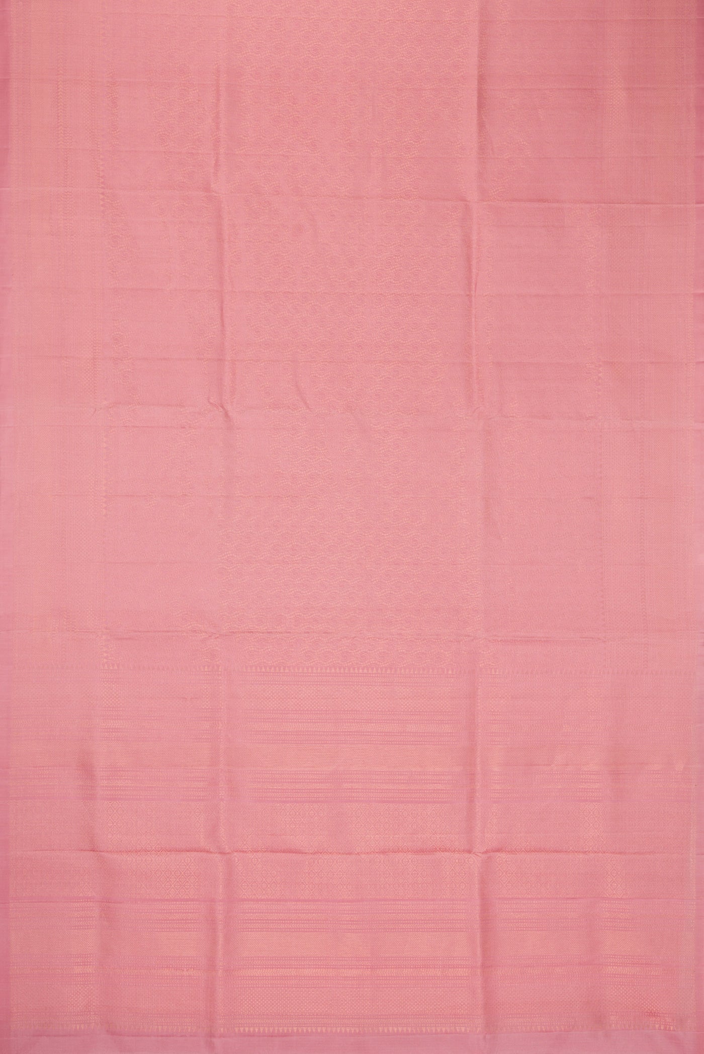 Flat view of Rose Gold Dual Tone Soft Silk Saree with Zari Brocade on the body and Zari Border. 