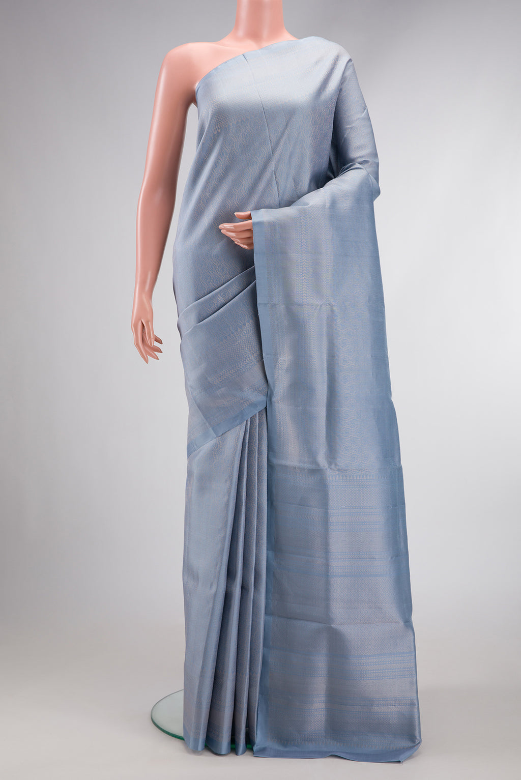 Grey Dual Tone Soft Silk Saree with Zari Brocade on the body and Zari Border.  displayed on a mannequin
