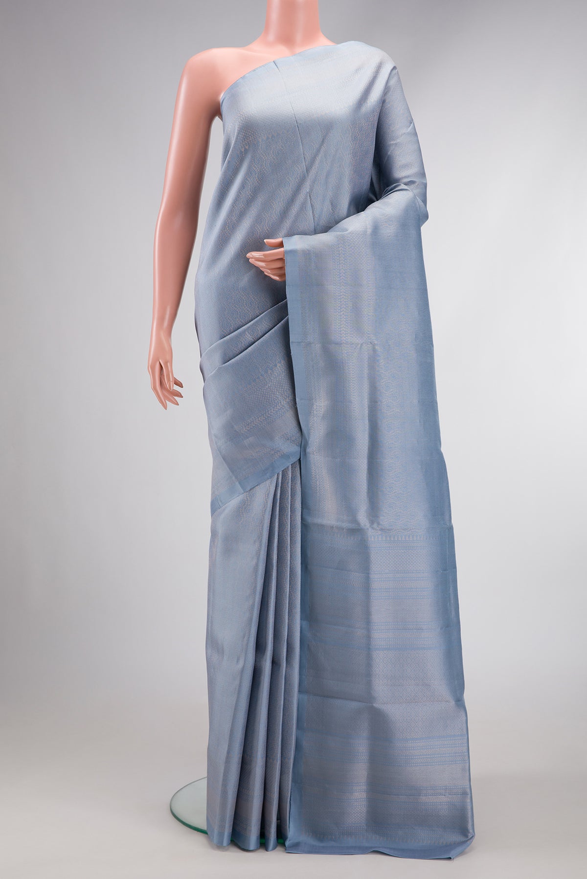 Grey Dual Tone Soft Silk Saree with Zari Brocade on the body and Zari Border.  displayed on a mannequin