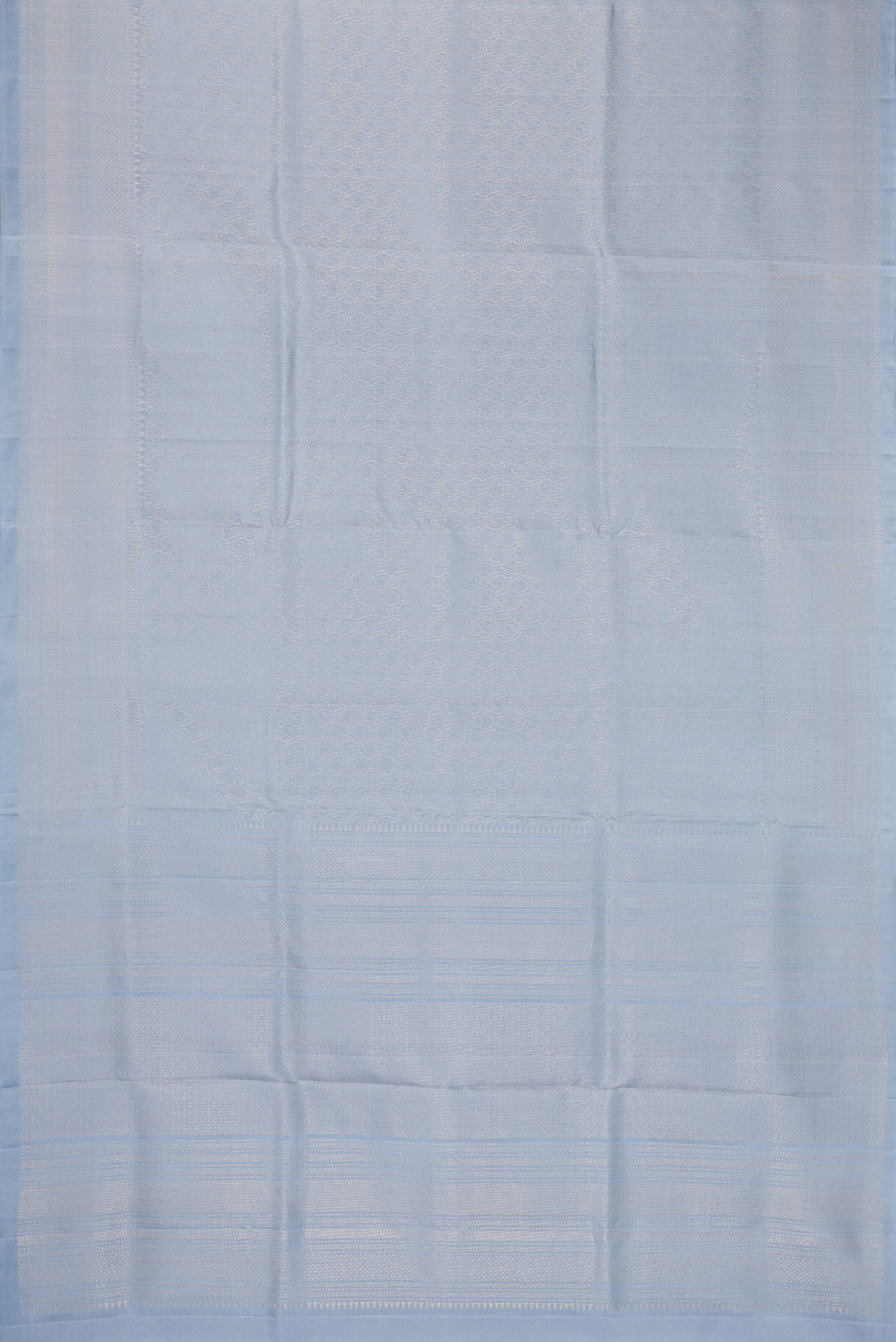 Flat view of Grey Dual Tone Soft Silk Saree with Zari Brocade on the body and Zari Border. 