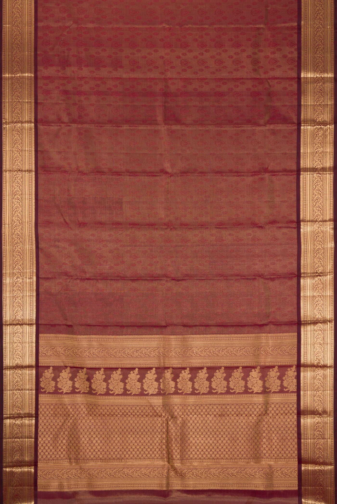 Flat view of Maroon Dual Tone Kanchipuram Tissue Silk Saree with Zari Brocade on the body and Zari Border. 