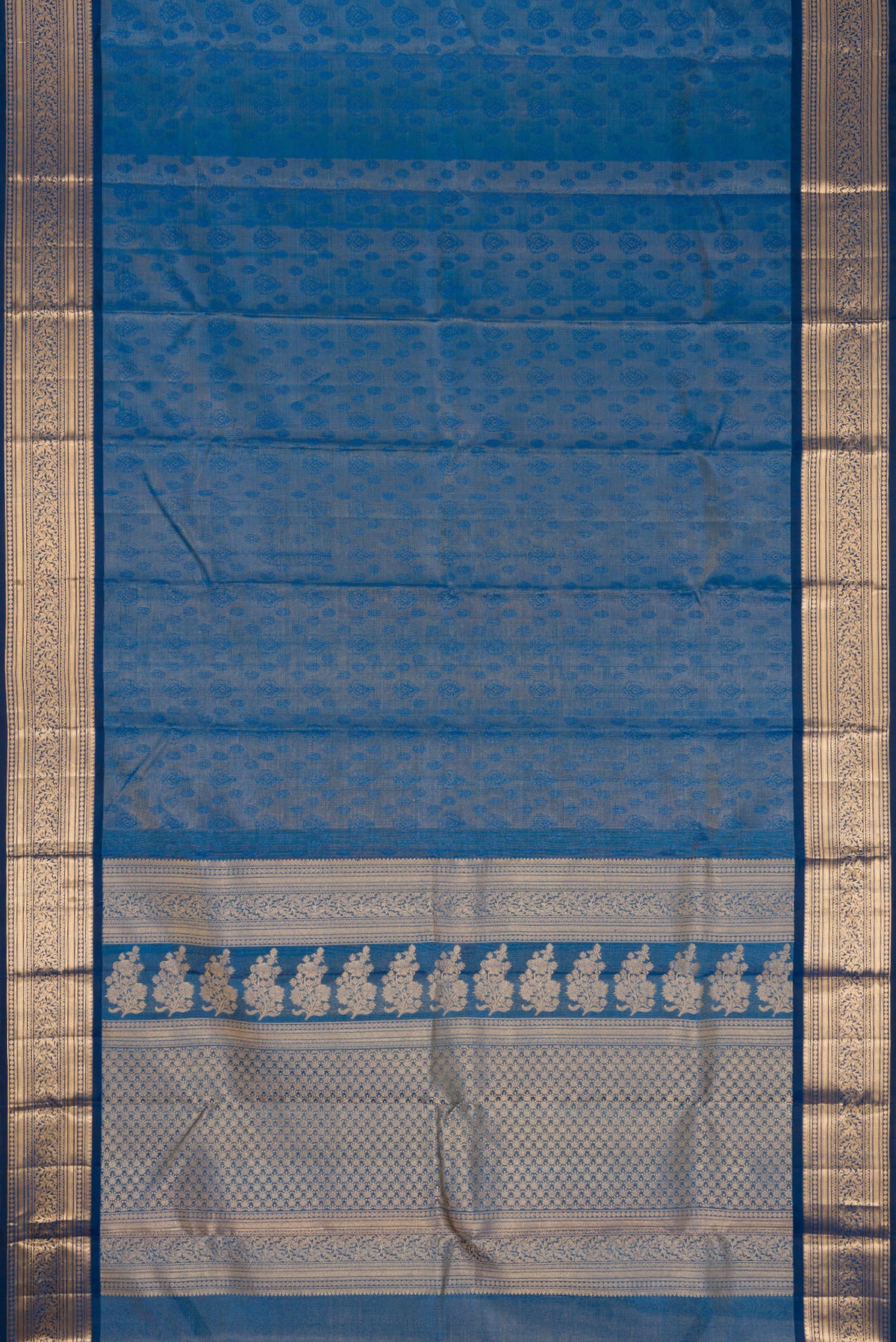 Flat view of Maya Blue Dual Tone Kanchipuram Tissue Silk Saree with Zari Brocade on the body and Zari Border. 