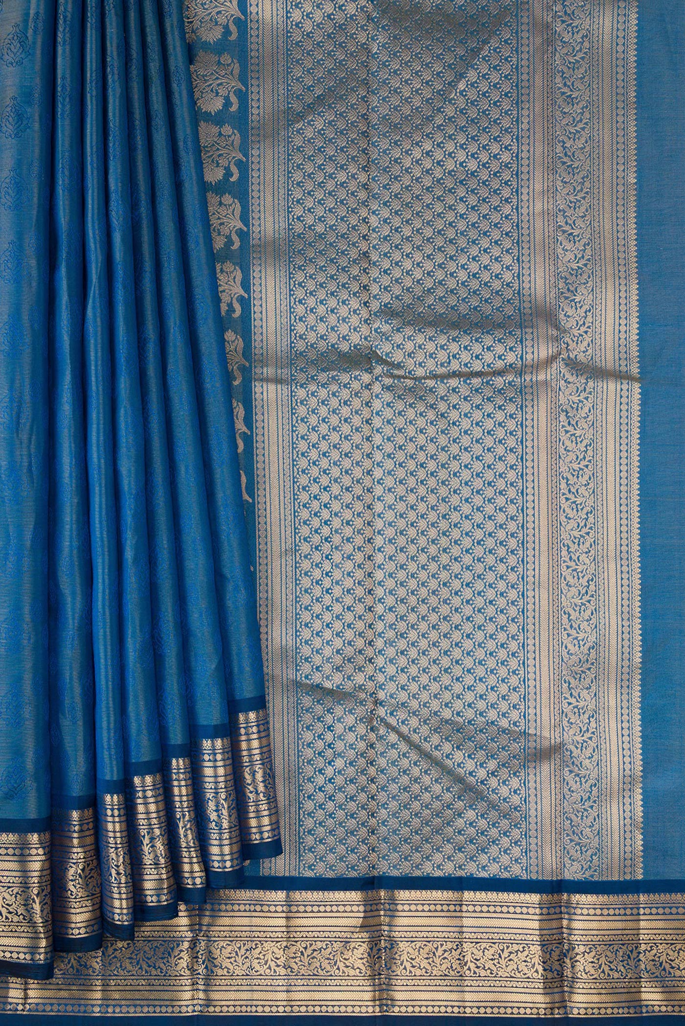 Pleats and pallu of Maya Blue Dual Tone Kanchipuram Tissue Silk Saree with Zari Brocade on the body and Zari Border. 